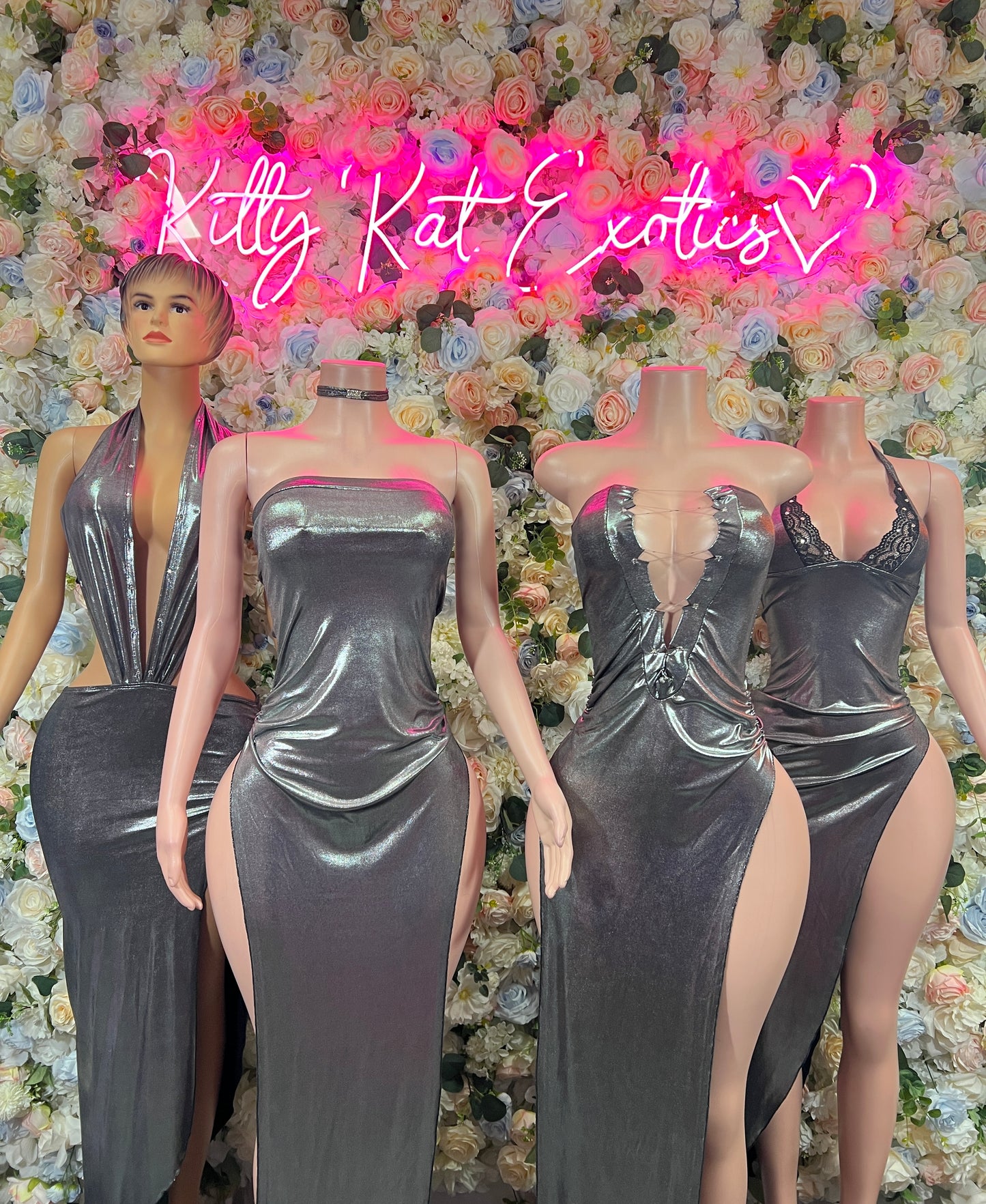 Metallic silver satin sleeveless gown with V-neck and thigh slit