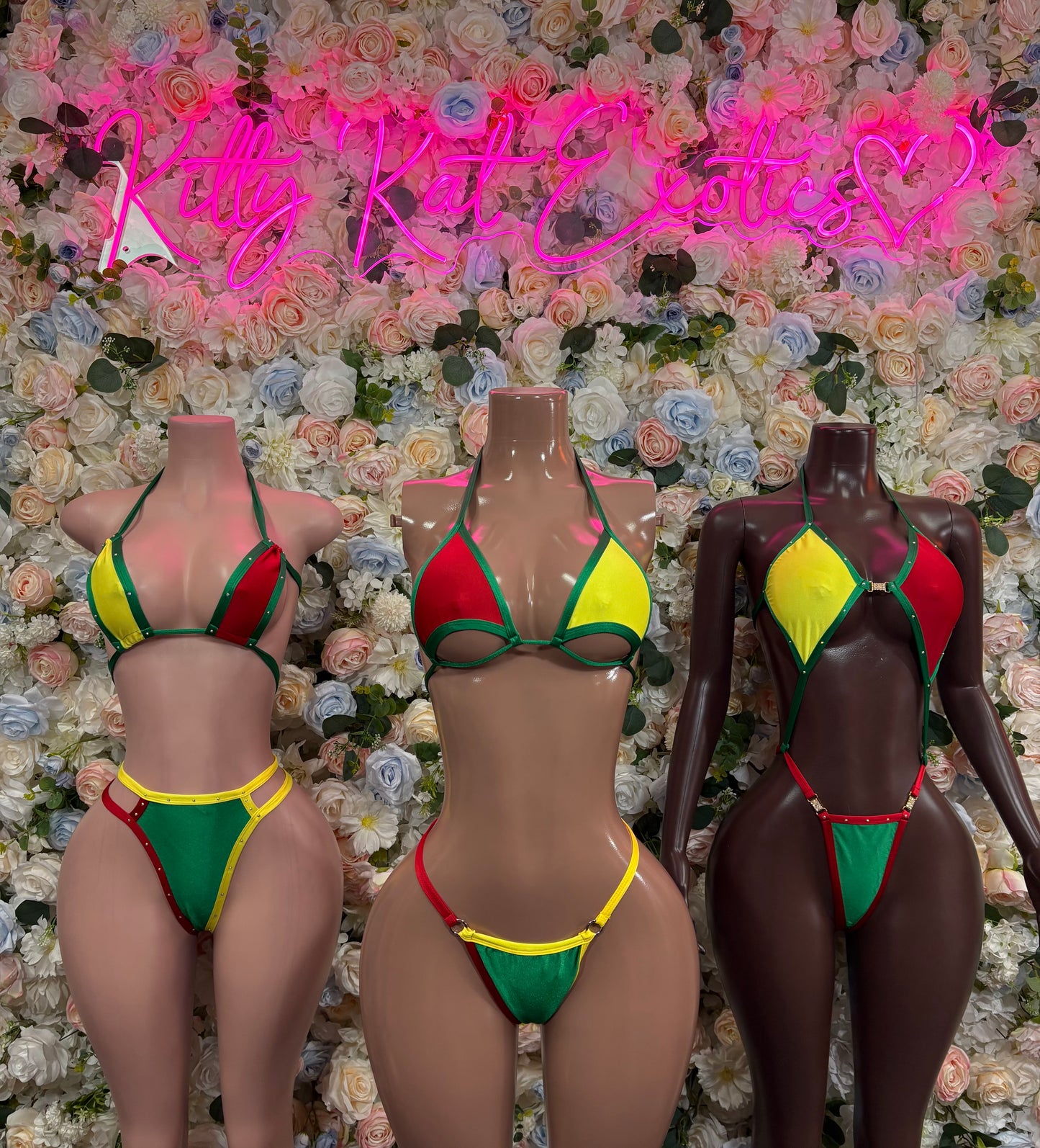 Flag bikini swimsuit on multiple mannequins with green yellow red triangle top