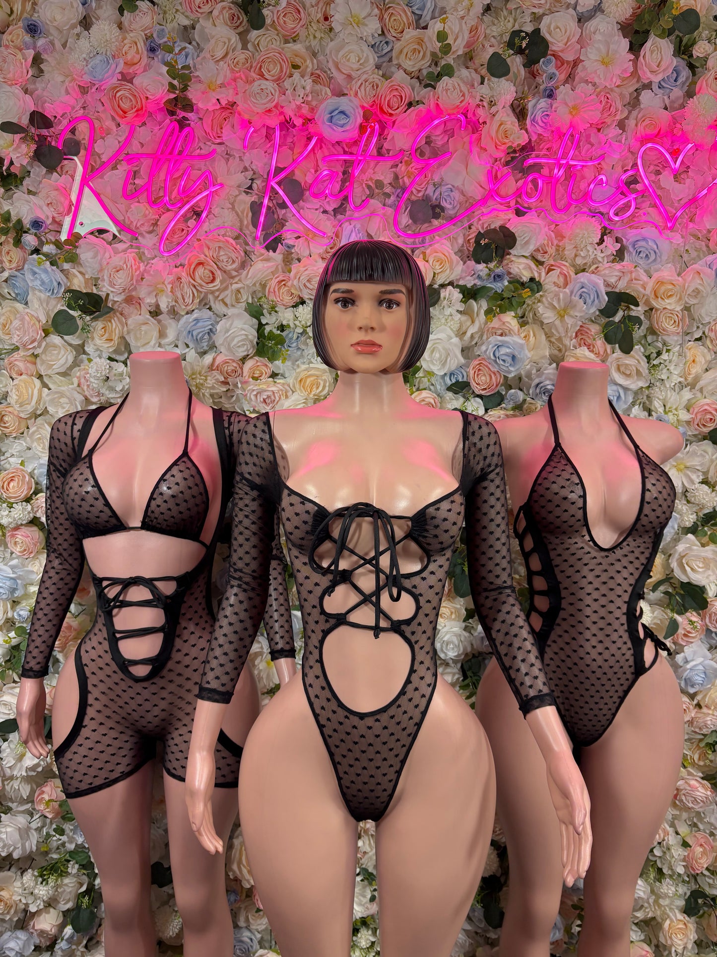 Black mesh heart one-piece bodysuit with lace-up neckline and cutout front