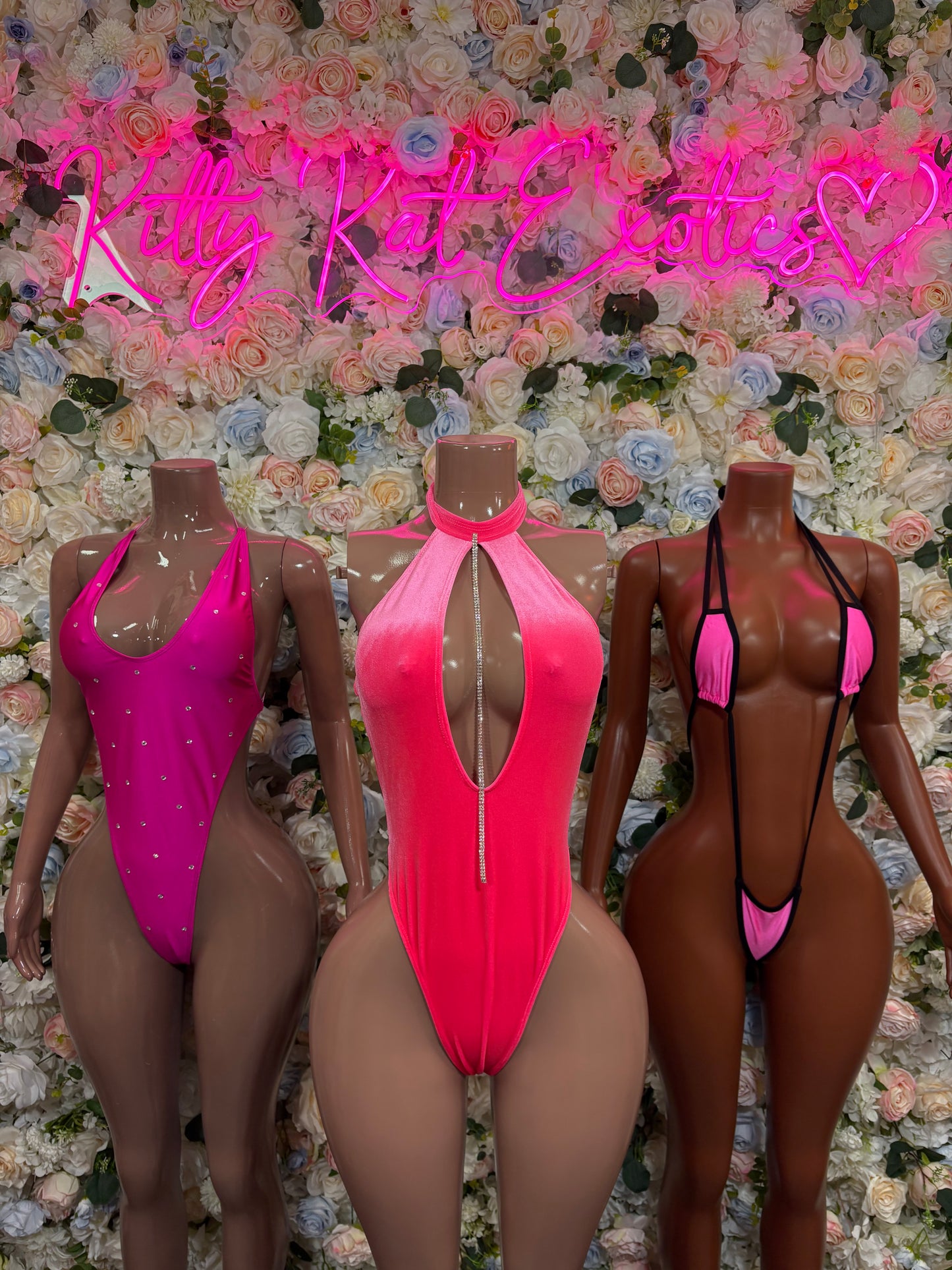 Pink halter one-piece bodysuit with keyhole front and high-cut leg