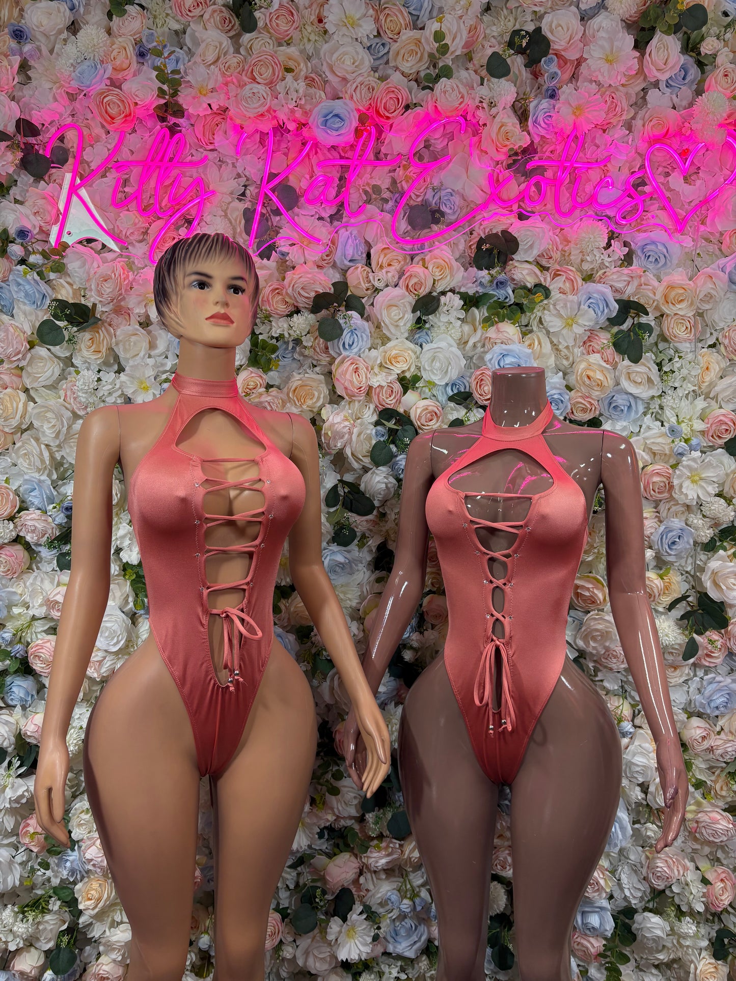 Rose pink halter bodysuit with front cutout lacing and cheeky high-cut bottom