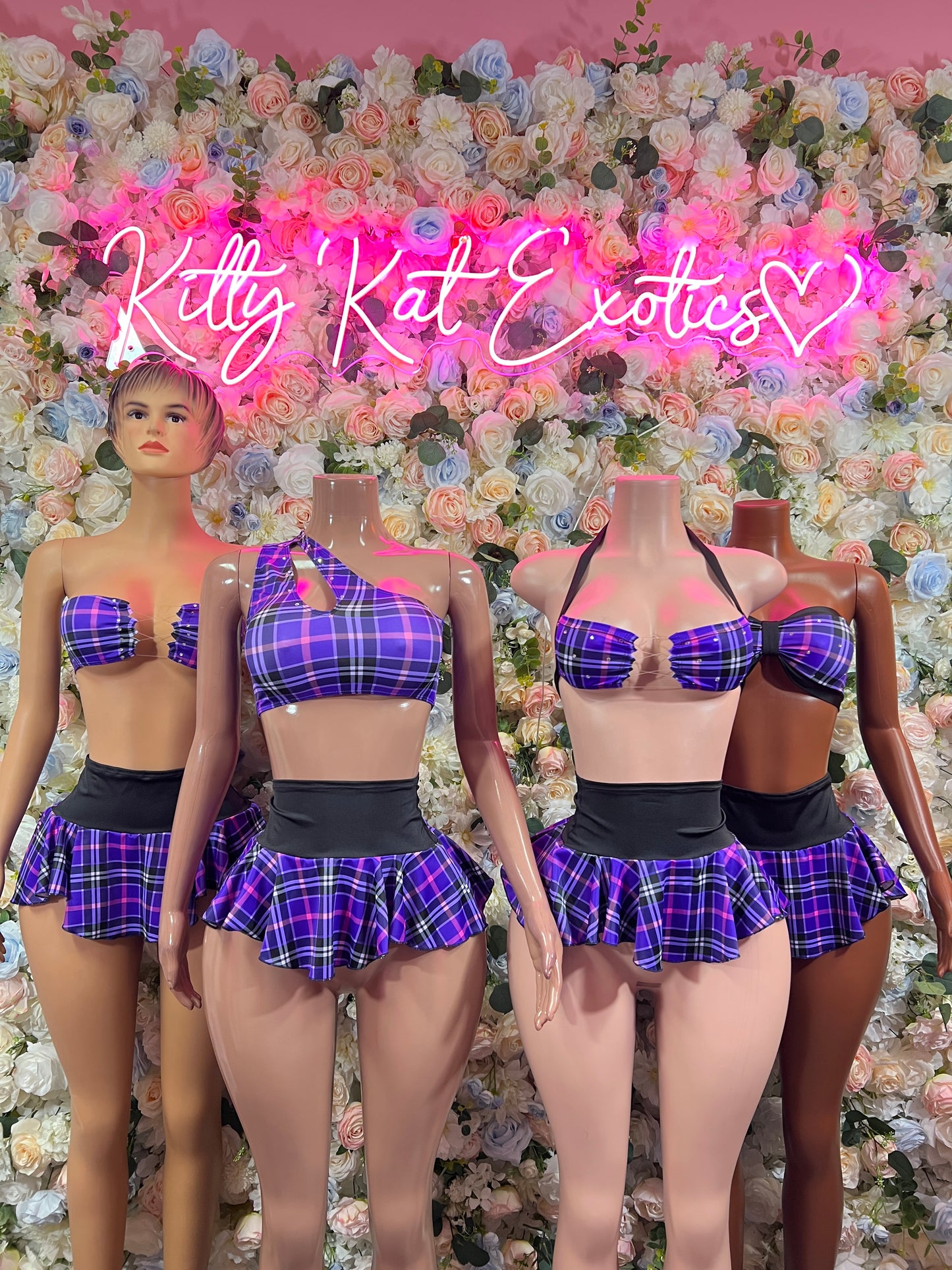 Purple plaid crop top and mini skirt set shown on multiple models