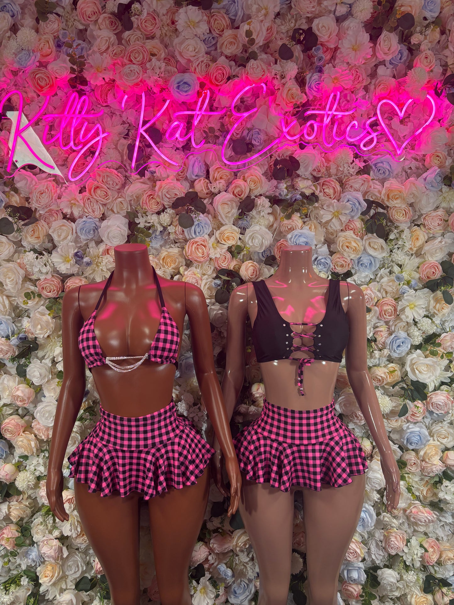 Two purple plaid two-piece skirt sets, halter tops and flared mini skirts