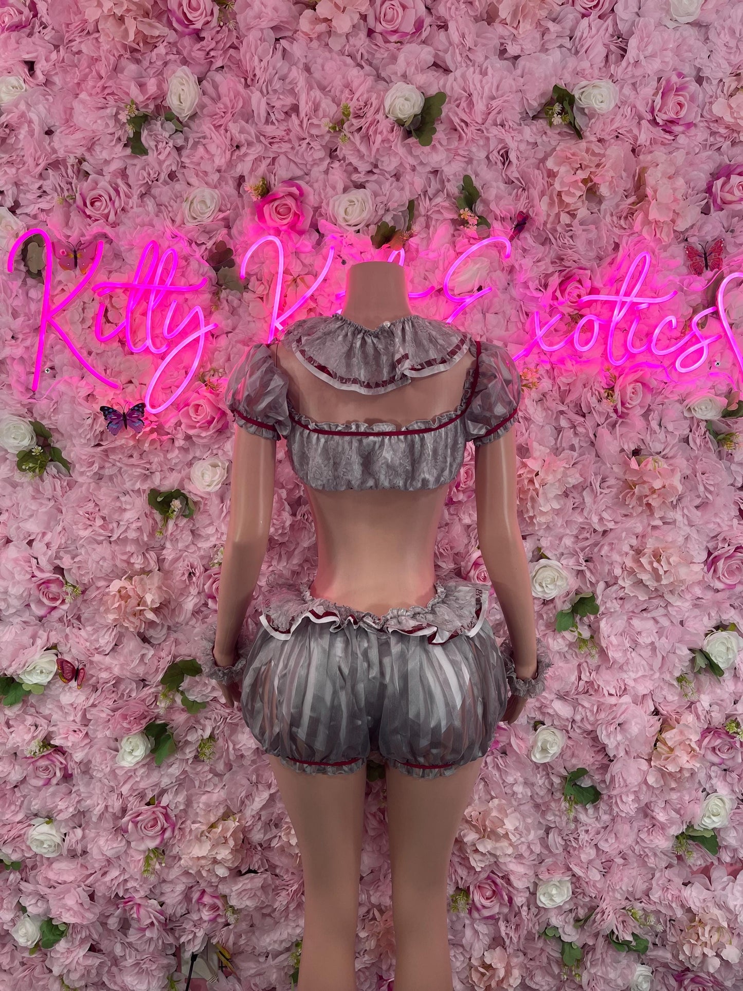 Gray ruffled costume back with bow and red heart trim, matching mini shorts