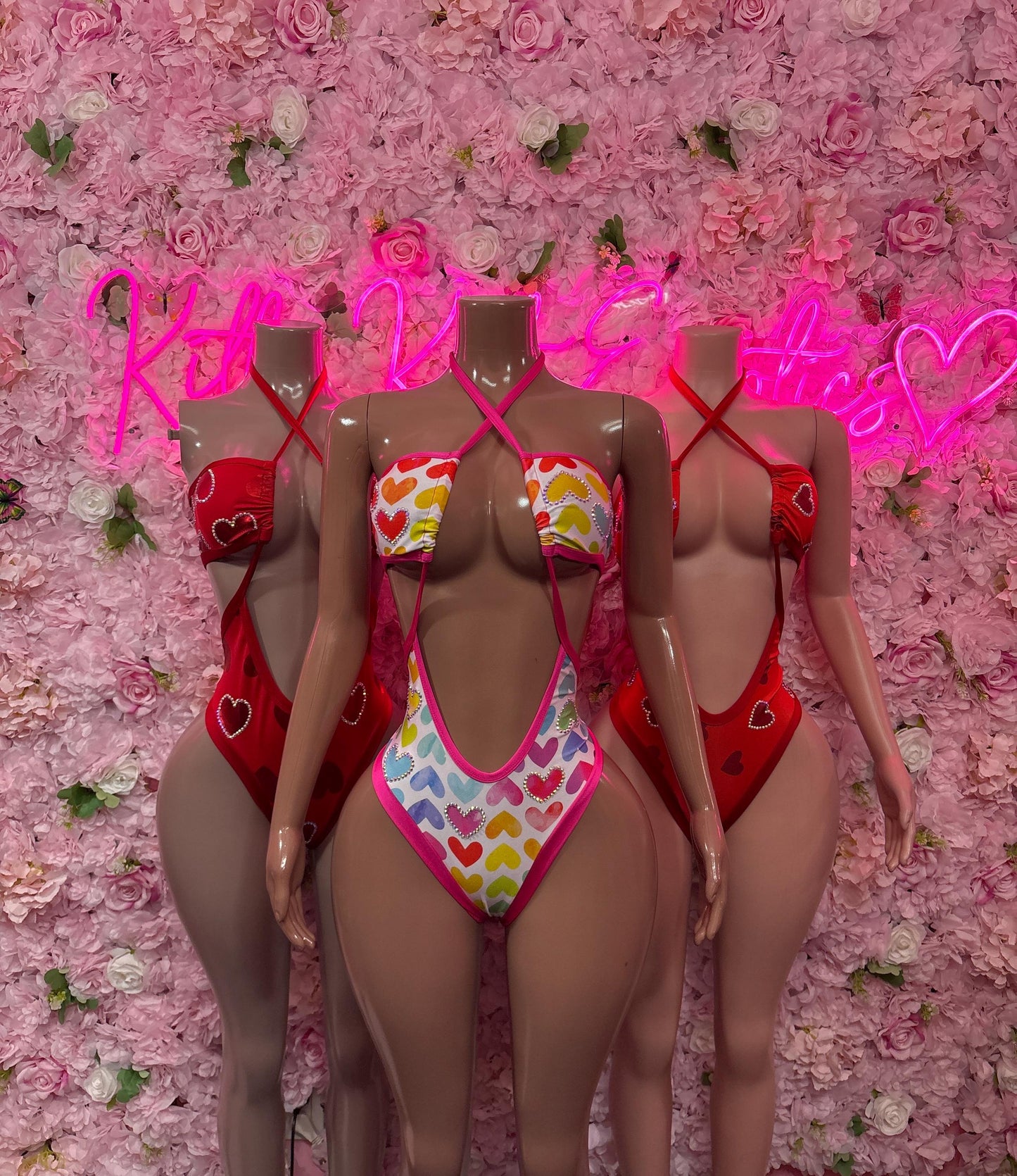 Heart lingerie bodysuit set: red heart-cutout styles and one multicolor heart-print piece