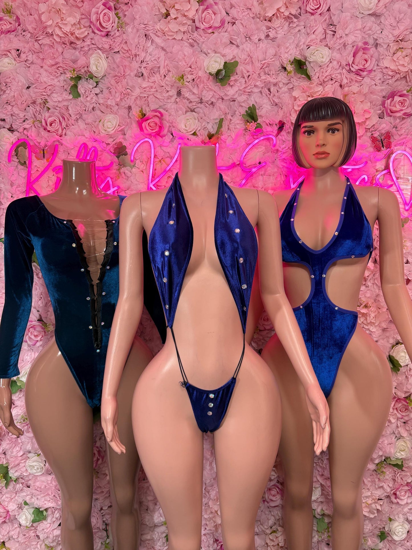 Blue velvet halter bodysuit with high-cut bottom and open back