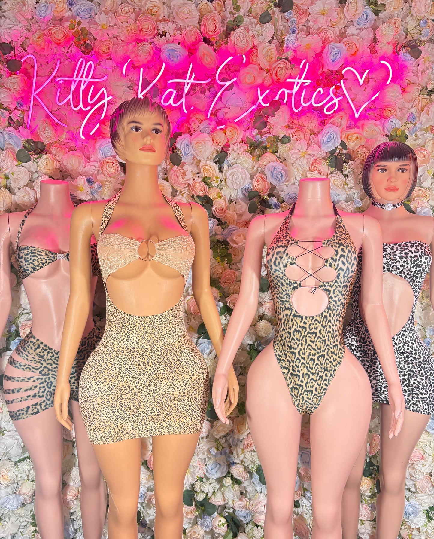 Leopard-print rave bodysuit with scoop front and crisscross cutout straps