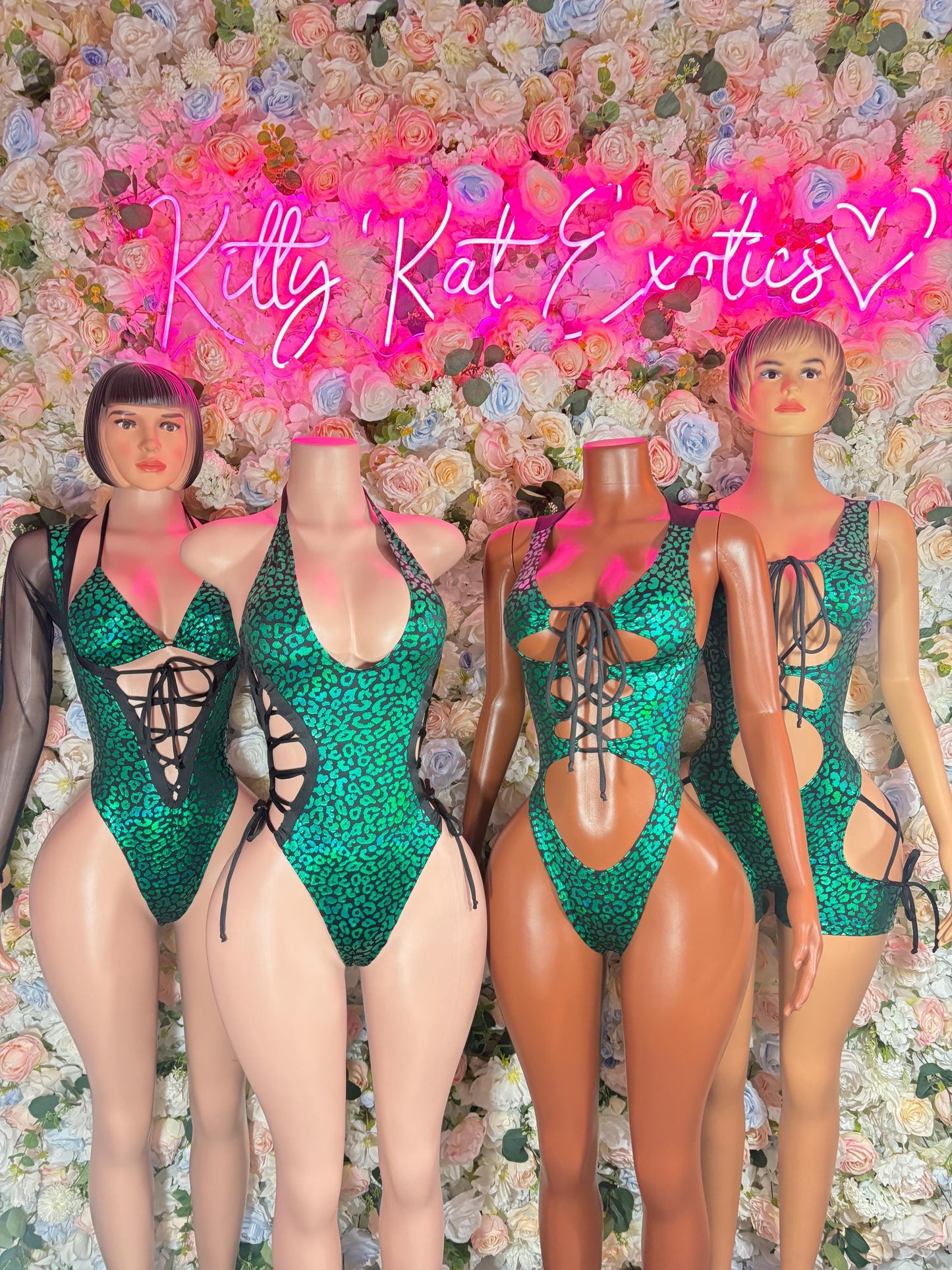 Green cheetah print one-piece bodysuit with cutout front and crisscross straps