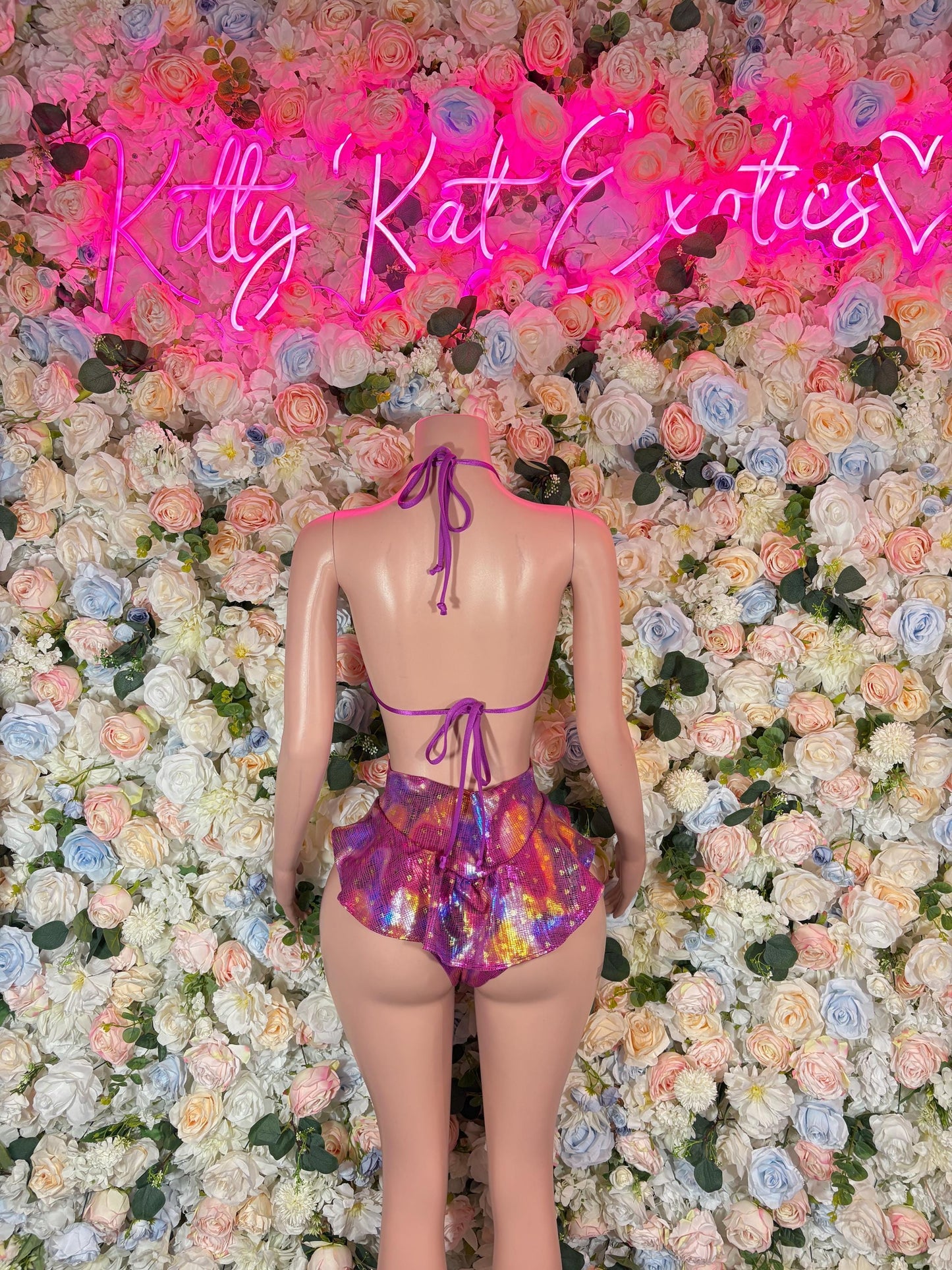 Purple metallic two-piece outfit back view with tie halter bra and bikini bottoms