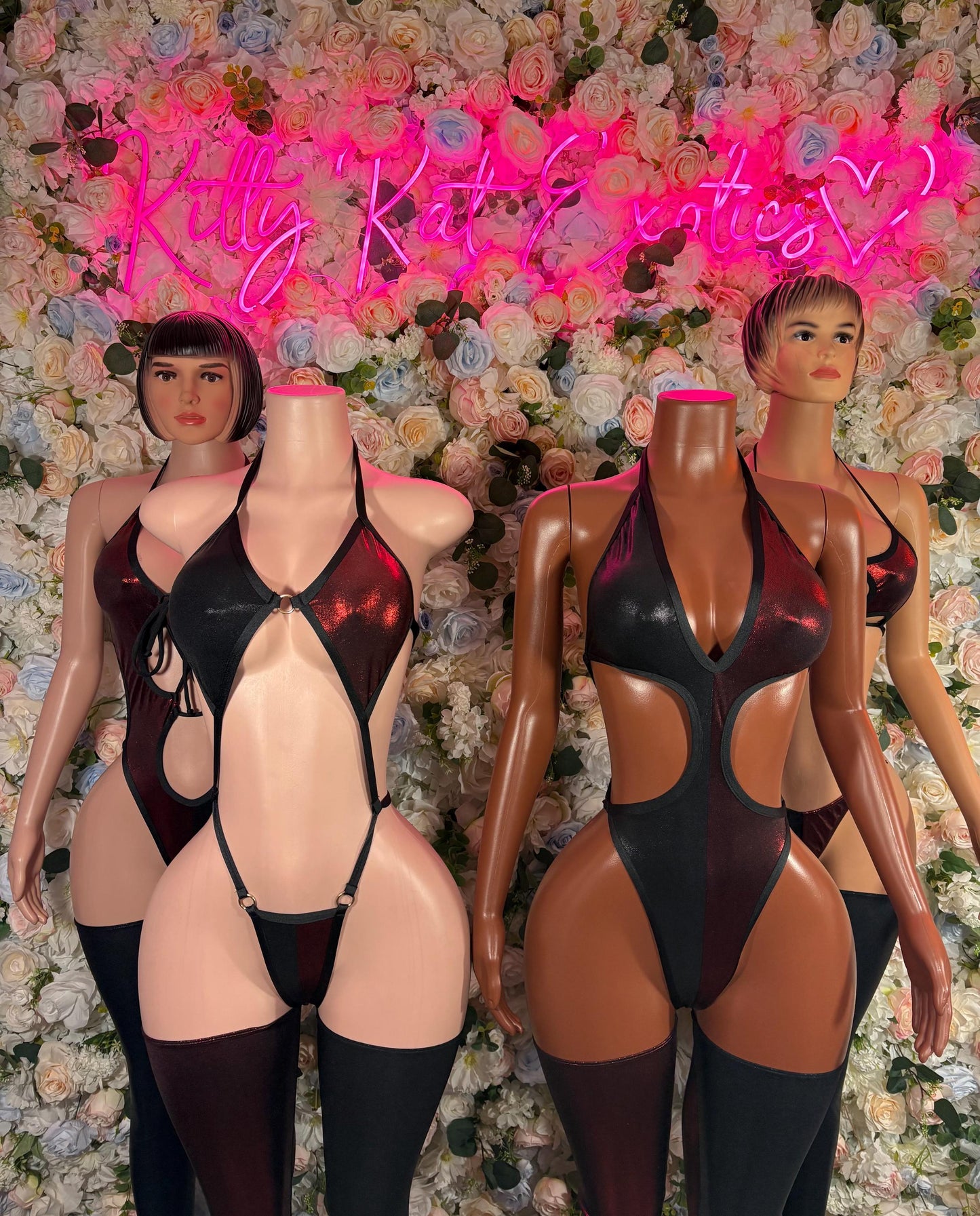 Women’s black bodysuit with maroon accents, cutout straps and open-back design