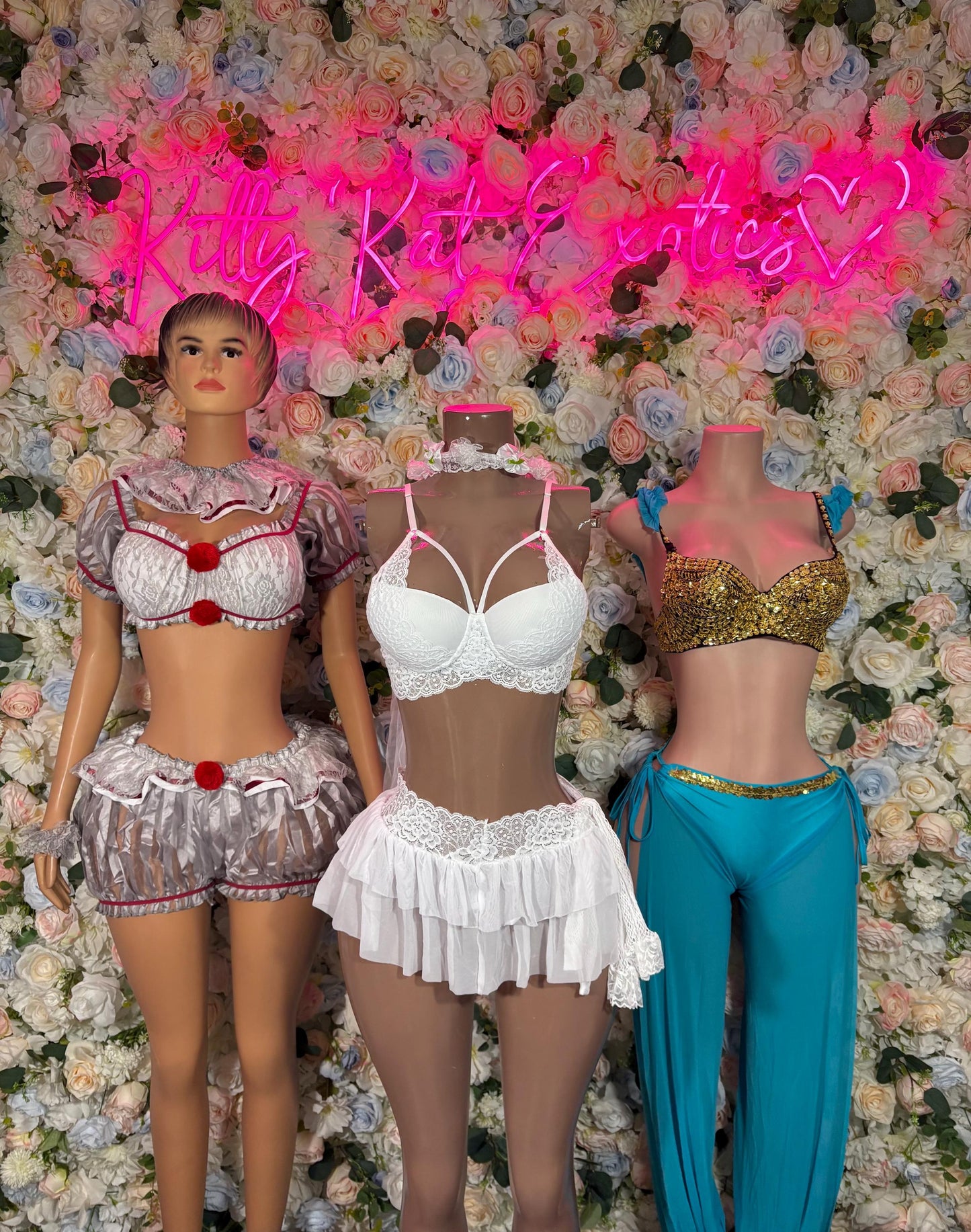Women’s Halloween costume set with silver ruffle top, white bustier skirt, teal pants