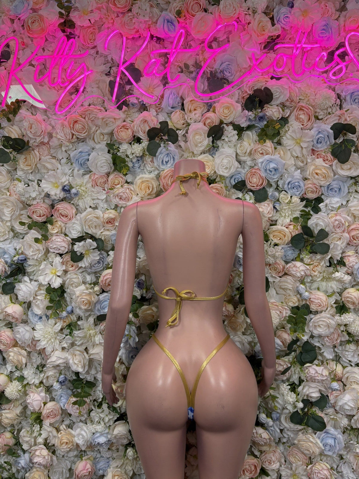 Triangle bikini with gold ties and star print, back view