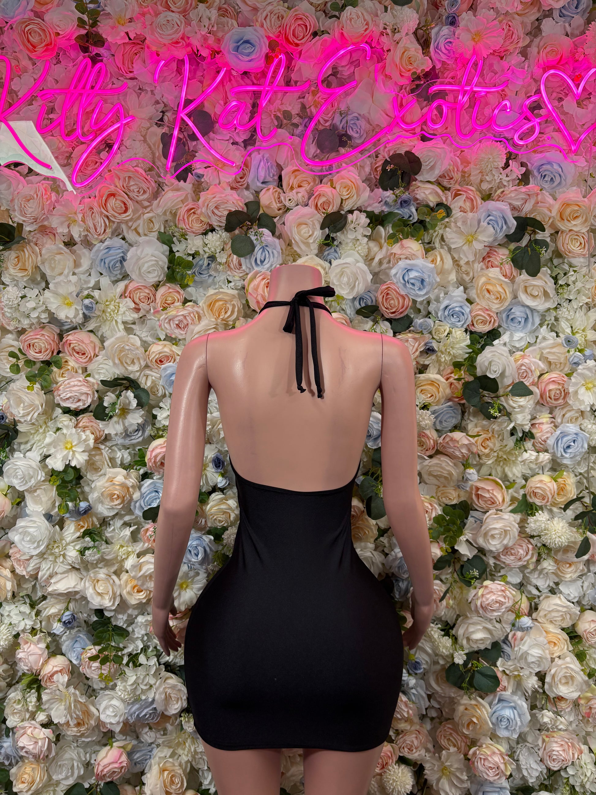 Black mini dance dress with open back and halter tie detail