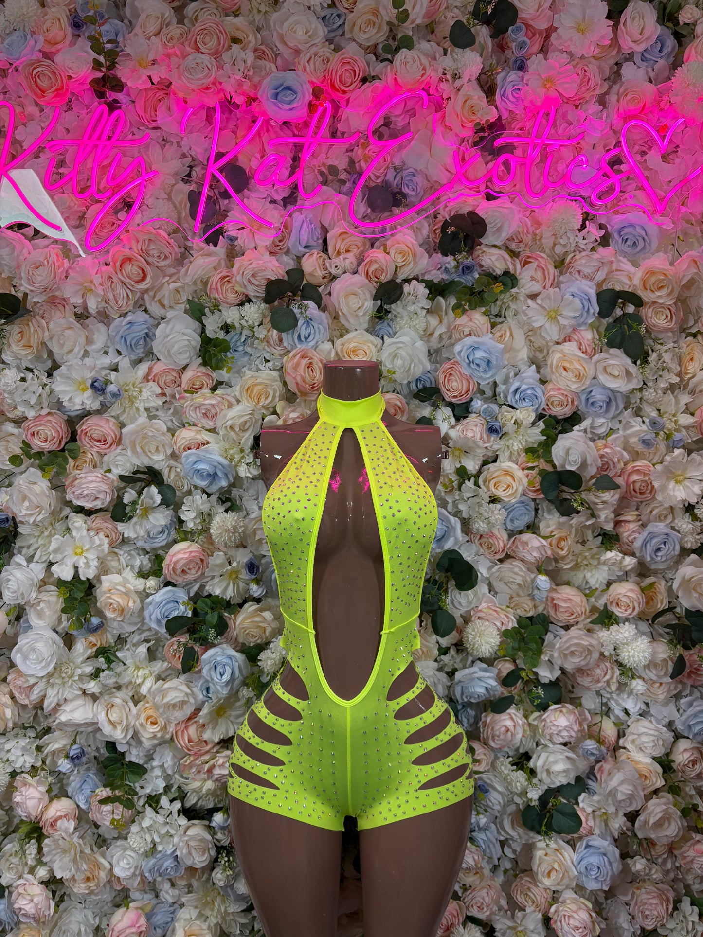 Neon green rhinestone bodysuit with high-leg cutout and halter neckline