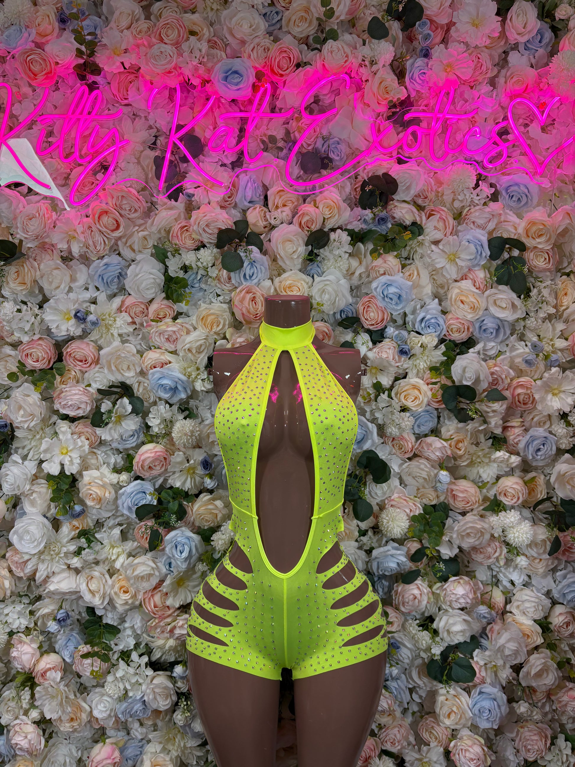 Neon green rhinestone bodysuit with high-leg cutout and halter neckline