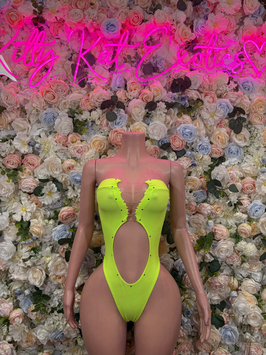 Neon green one-piece bodysuit with scoop neckline and high-cut leg openings