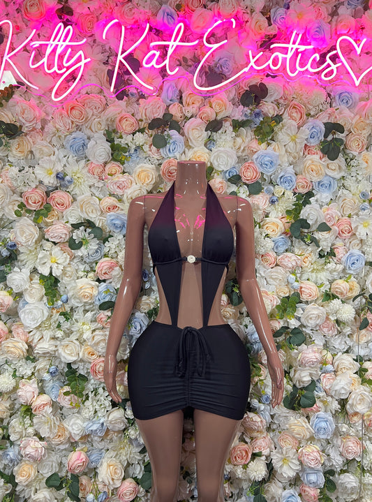 Black halter mini dress with chest cutout and ruched drawstring front