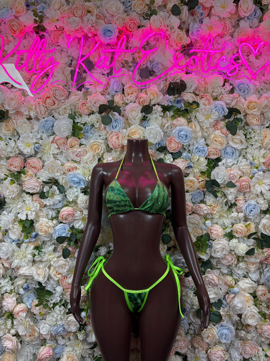 Green metallic triangle bikini with neon green tie straps, front view.