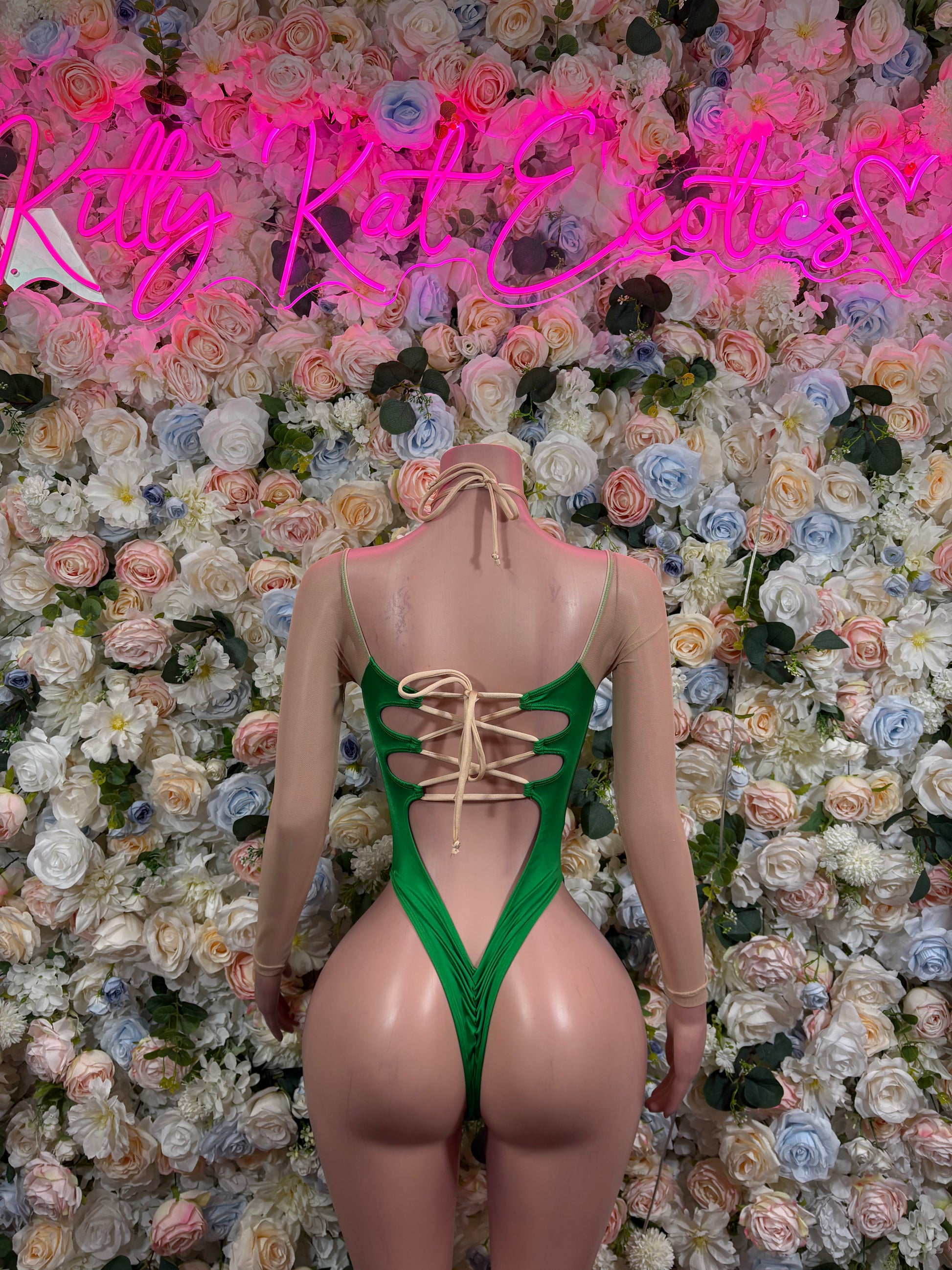 Green open-back lace-up bodysuit with tie at nape and V-cut