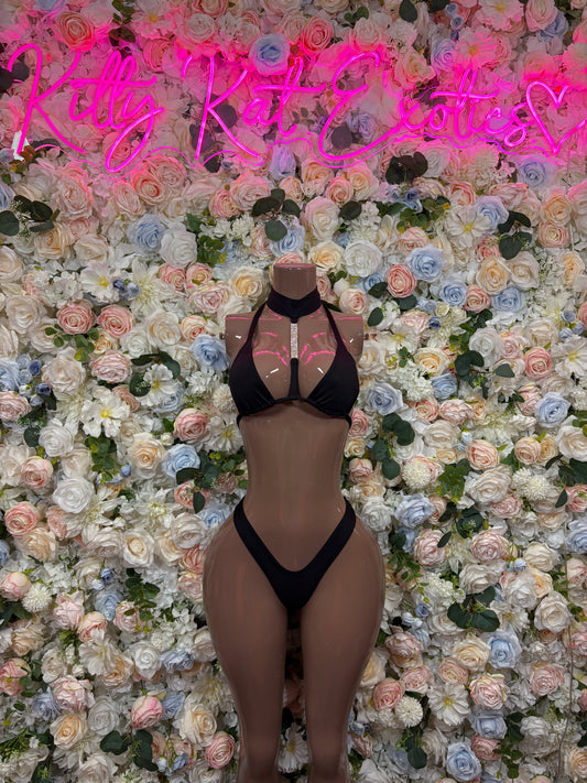 Black strappy two-piece dancewear set with halter bra and high-cut bottoms