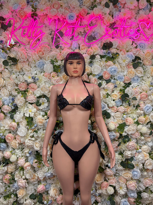 Black two-piece rave set with triangle bra and tie-side bottoms
