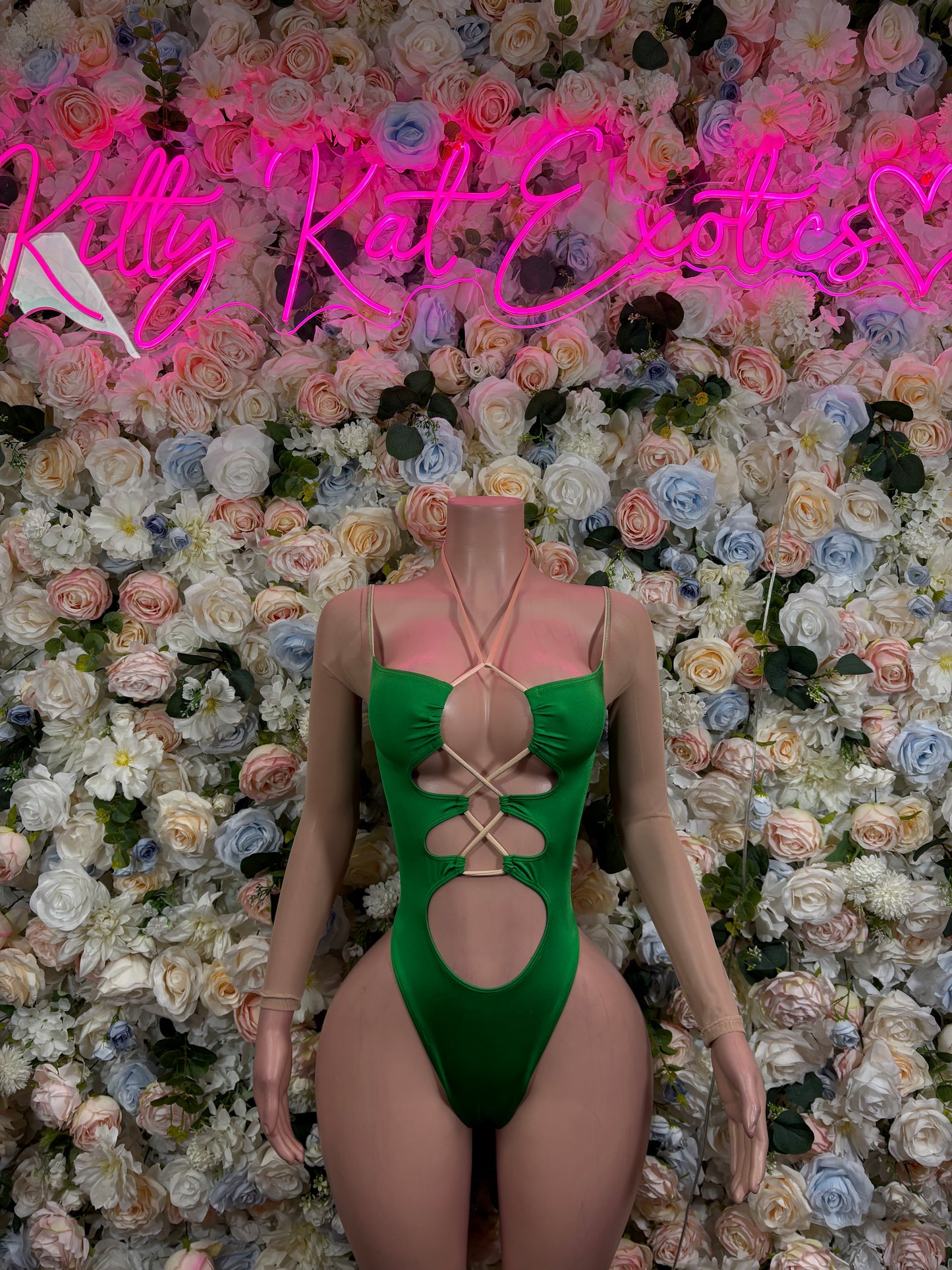 Green lace-up festival bodysuit with sweetheart neckline and cutout front