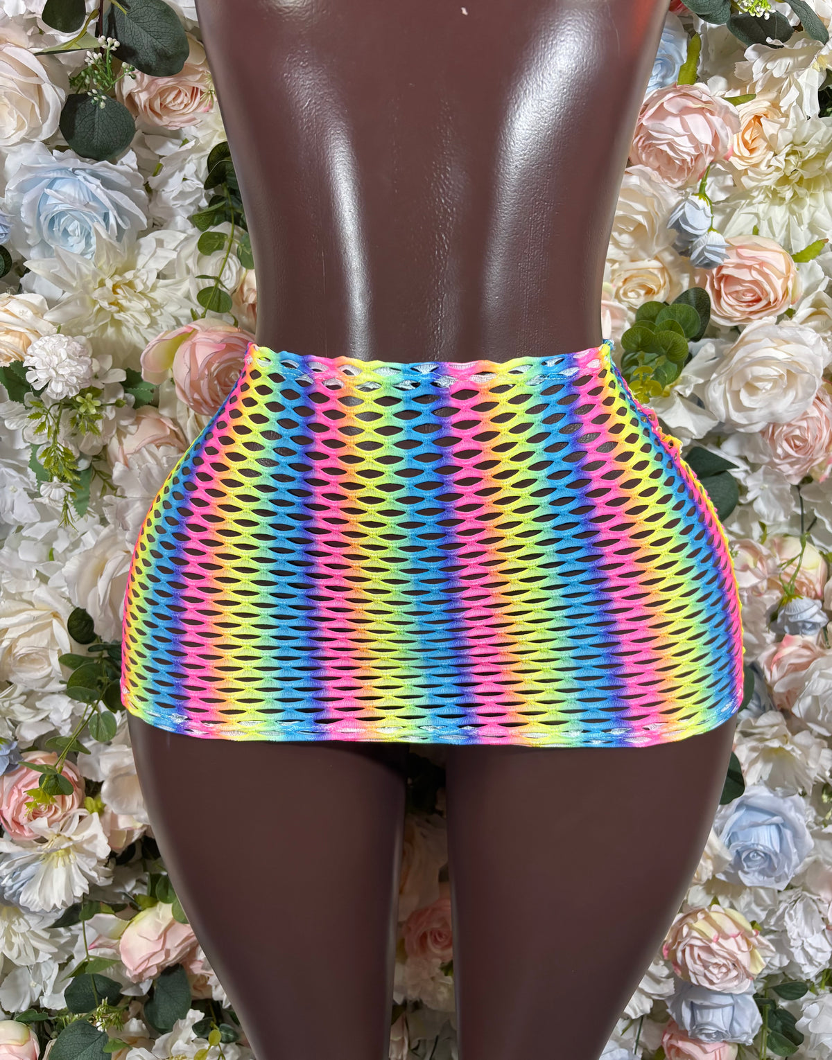 Multicolor rainbow fishnet mini skirt, sheer waistband and short straight hem
