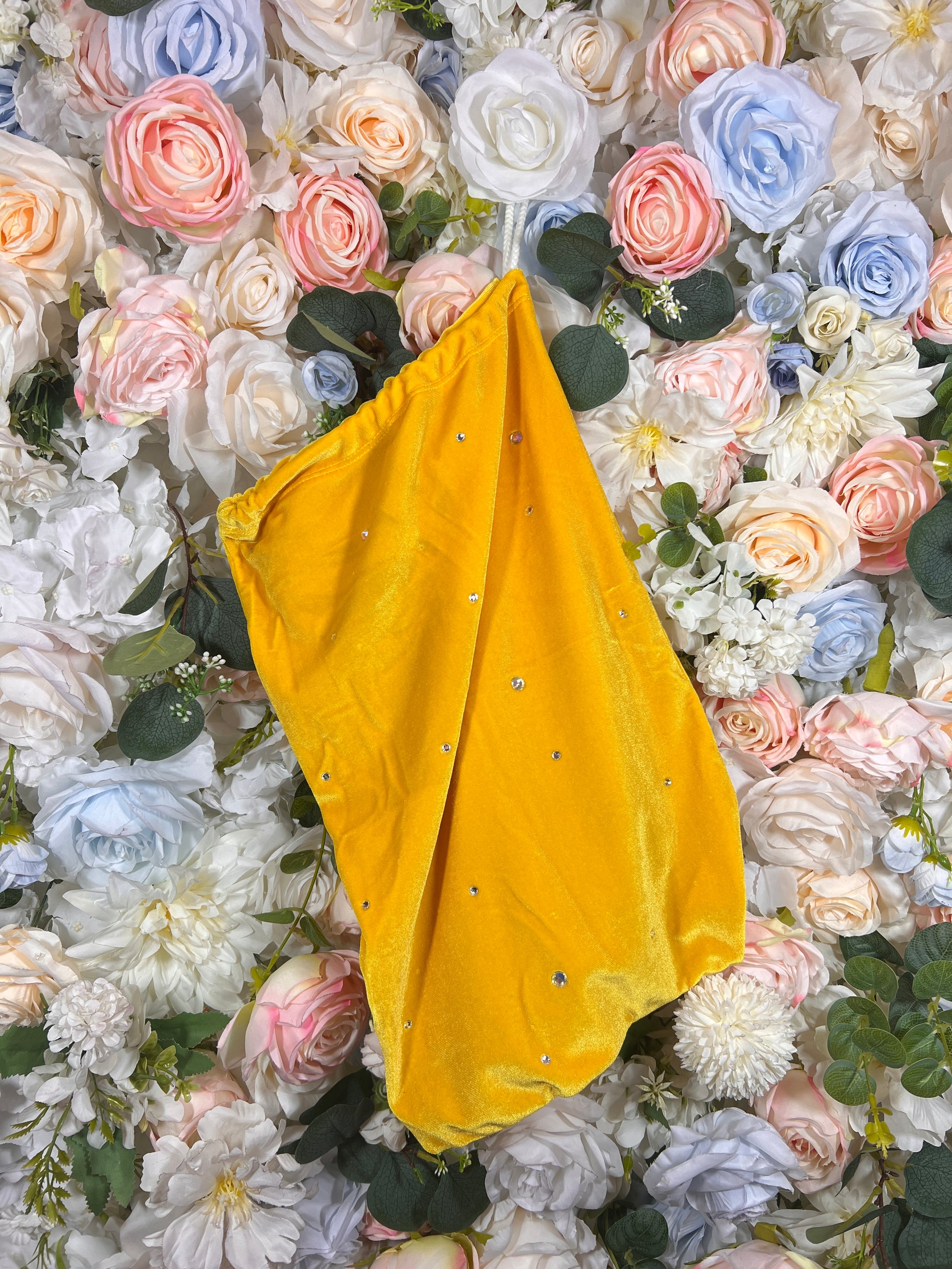 Yellow velvet money pouch with gathered top and hanging ties