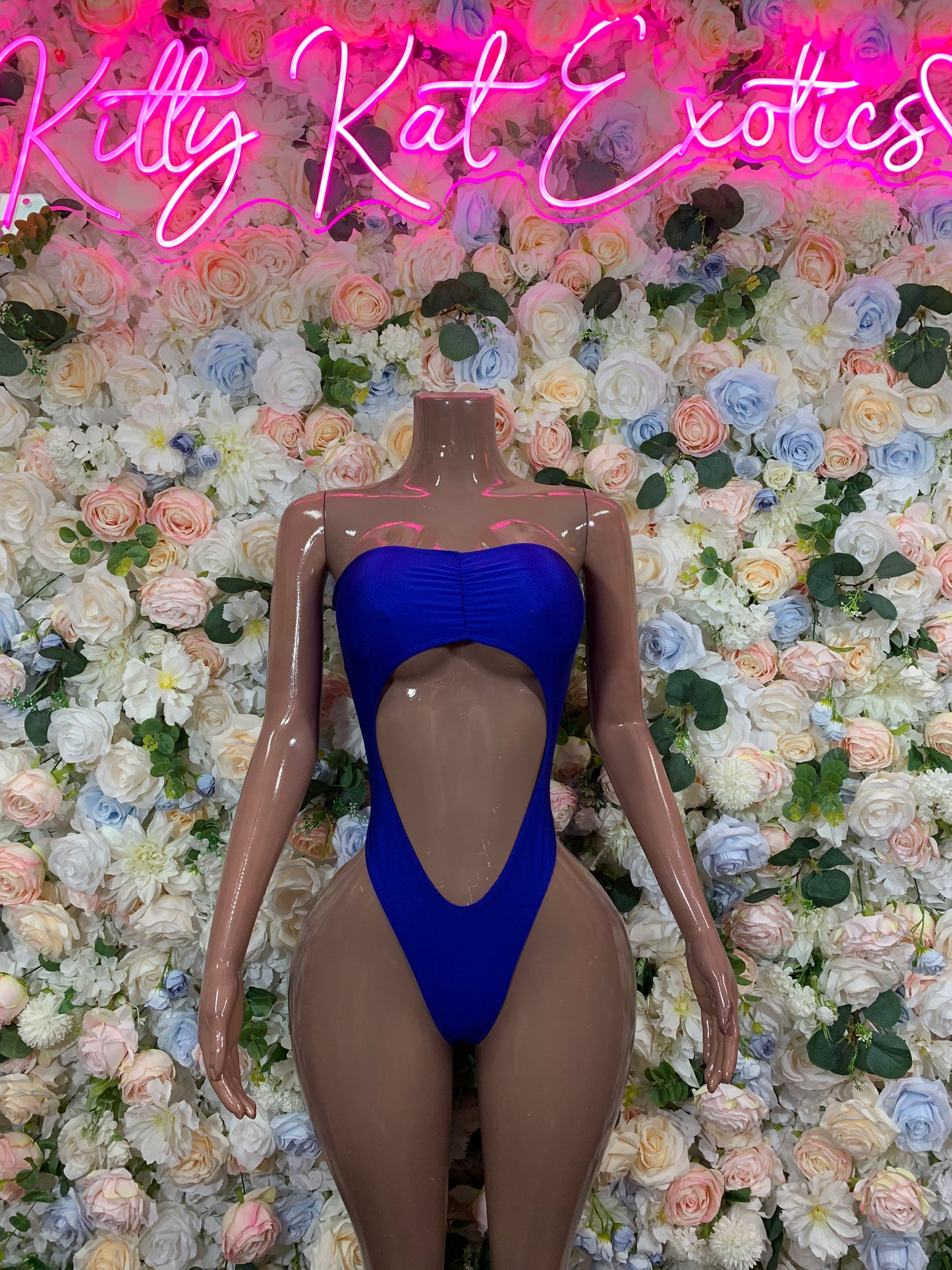 Blue strapless-style bodysuit with sweetheart neckline and center front cutout
