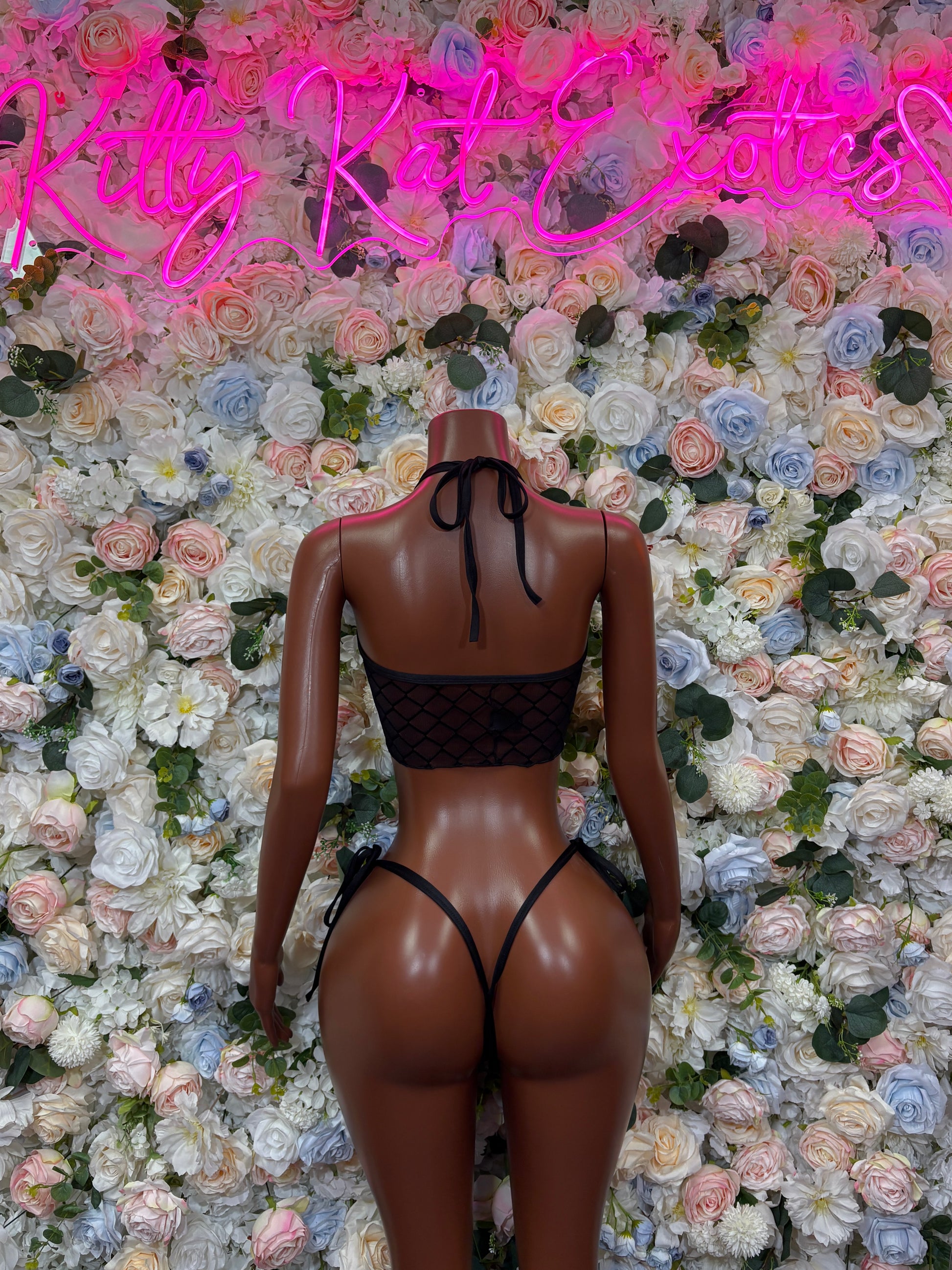 Black two-piece lace mesh bikini with strappy open back and tie-side bottoms