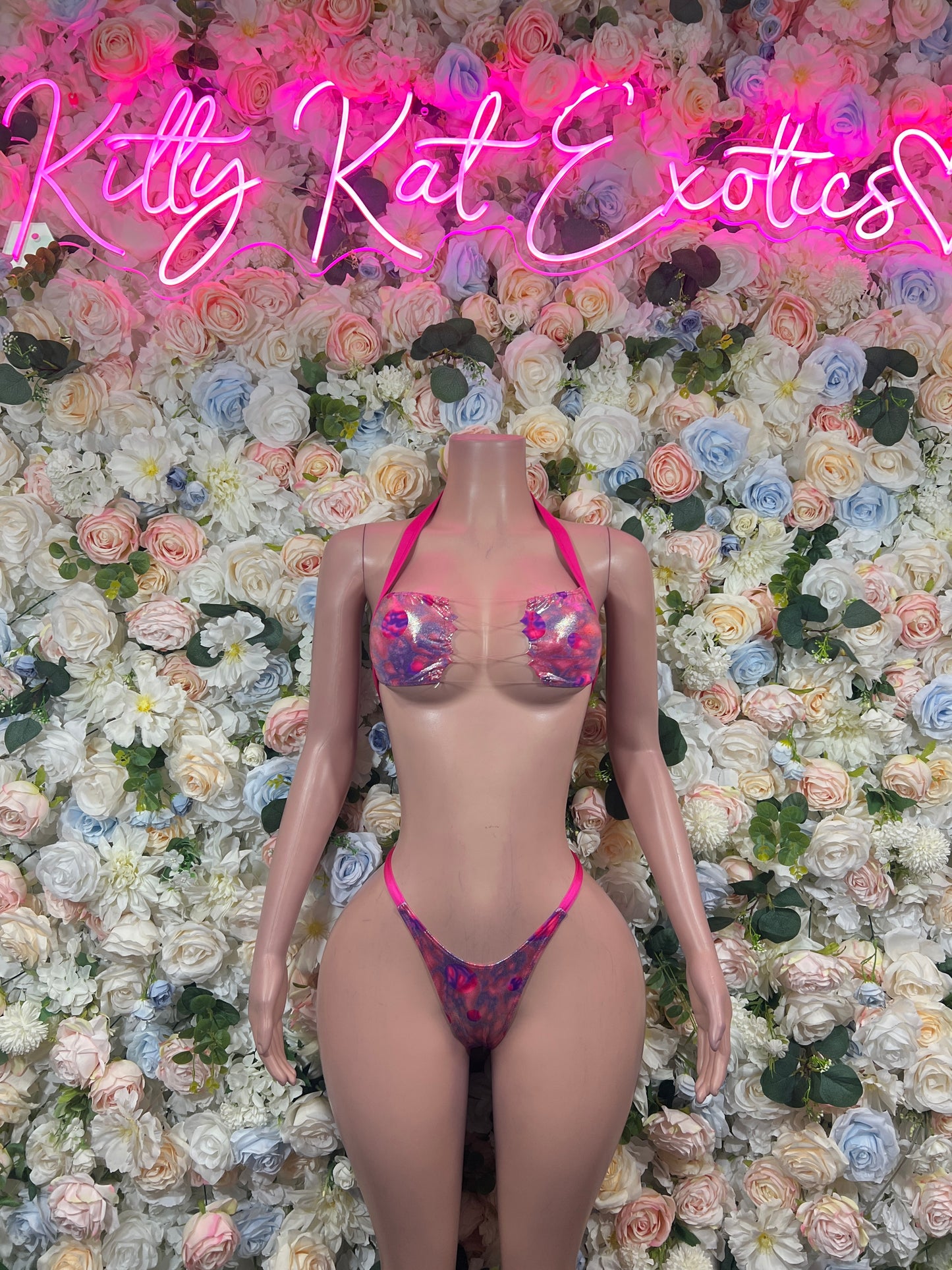 Iridescent pink-purple holographic two-piece bikini set with triangle bra cups and thong bottoms
