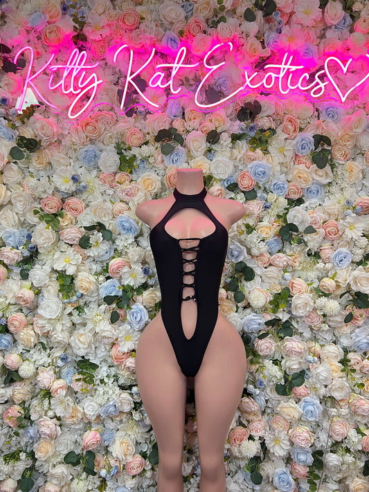 Black halter bodysuit with oval chest cutout and center lace-up