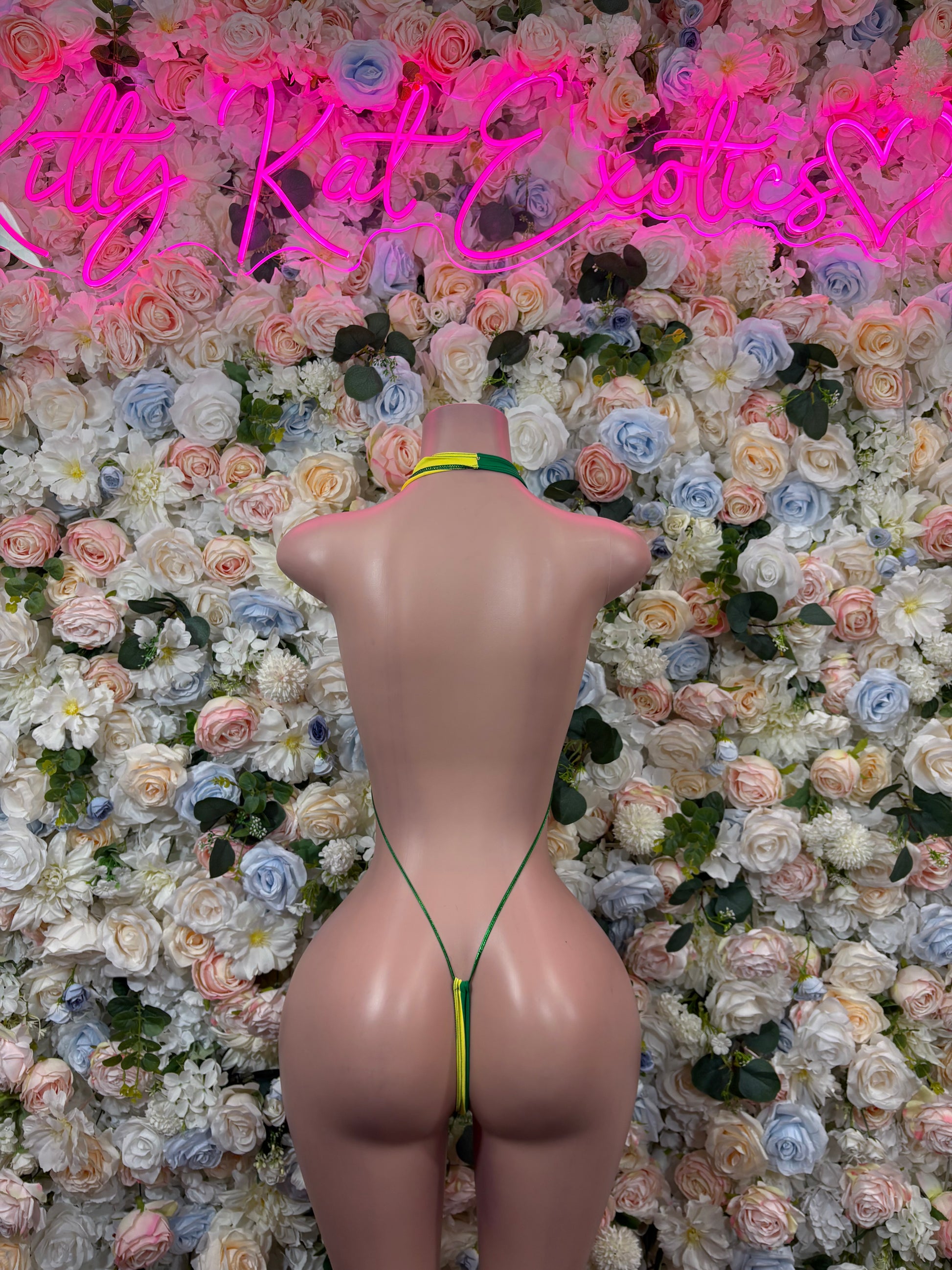Slingshot one-piece swimsuit, green and yellow back with thin tie straps