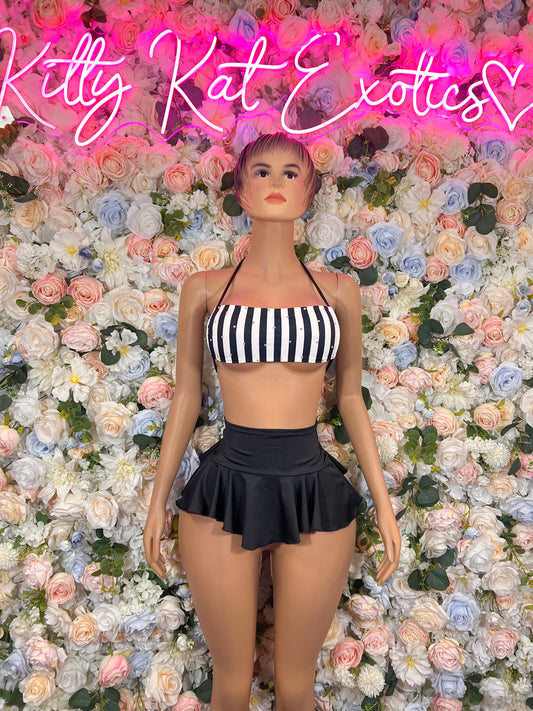 Two-piece costume set with black-and-white striped bandeau top and ruffled black skirt