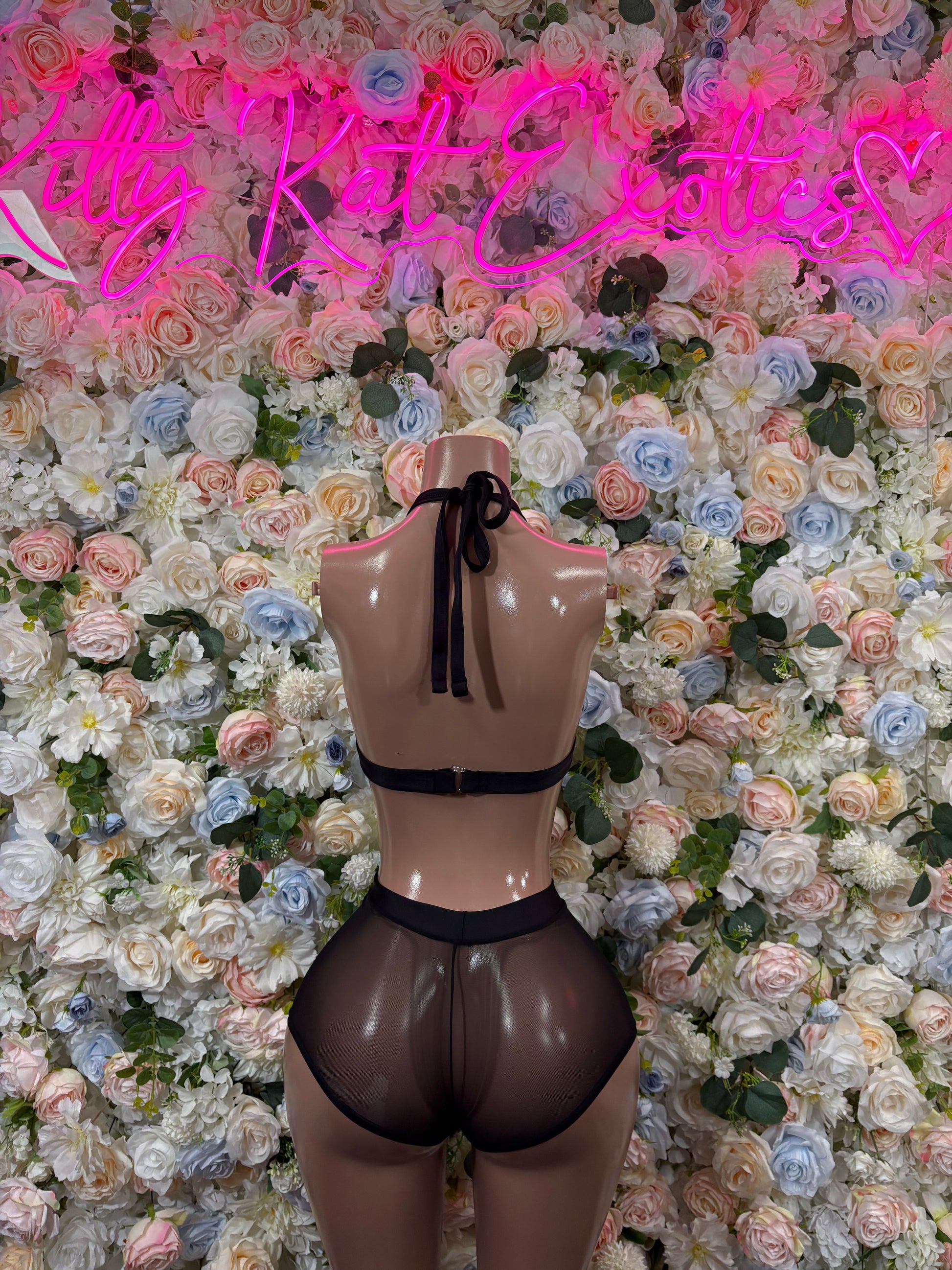 Black two-piece dancewear set with halter bra and high-cut thong