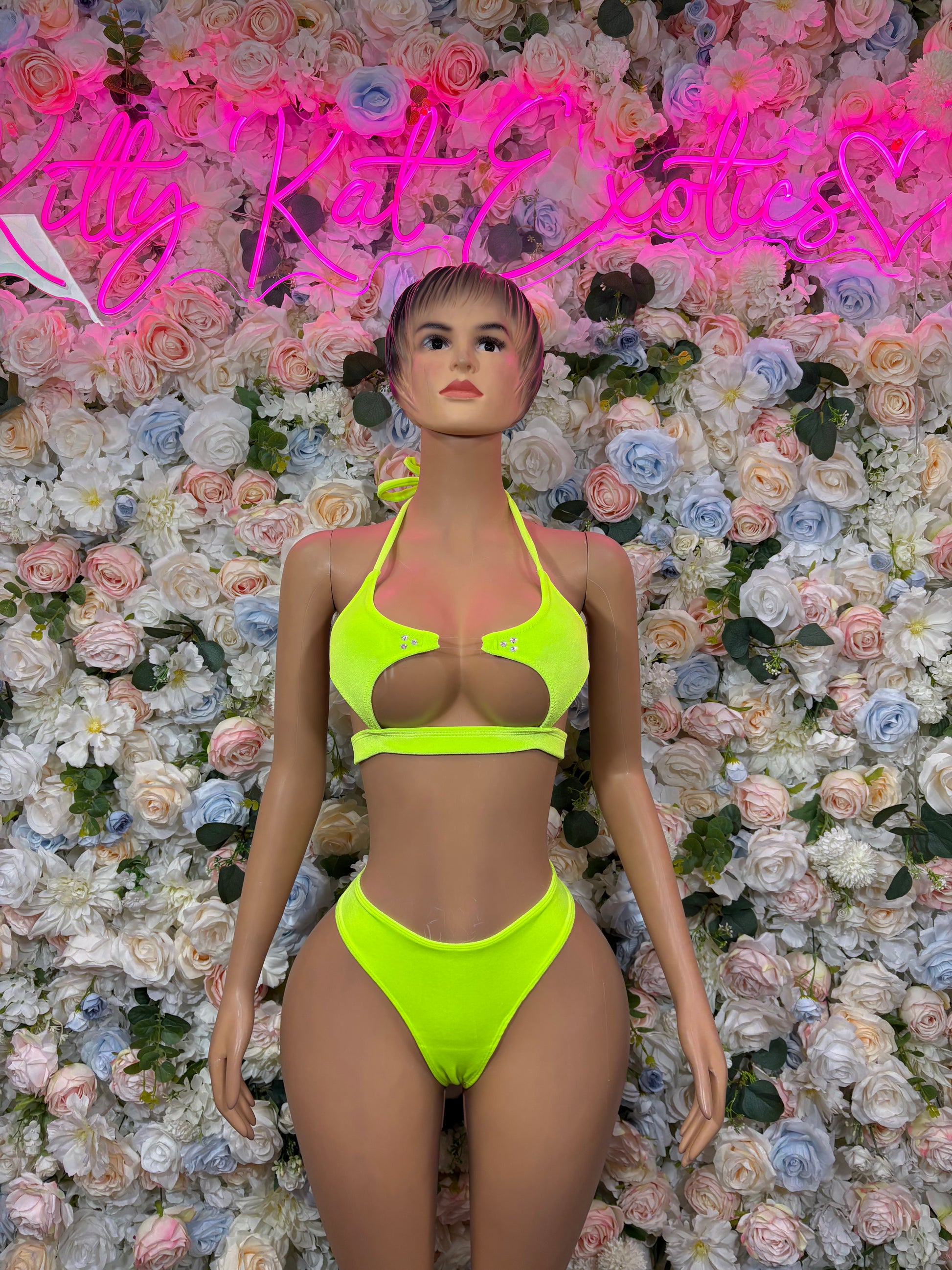 Neon green two-piece bikini set with triangle top and high-cut bottoms