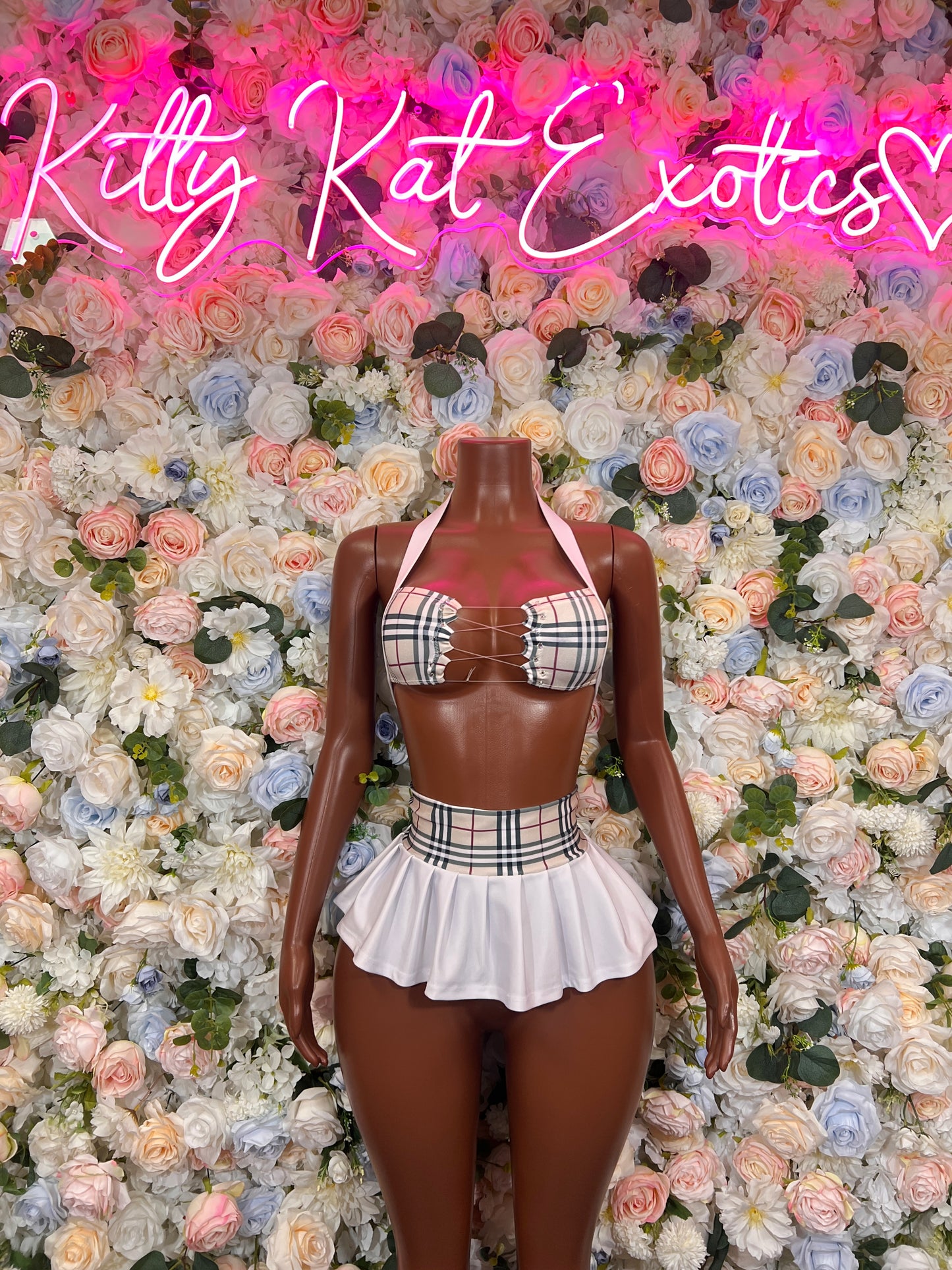 White ruffled skirt with plaid halter crop top, sporty two-piece set