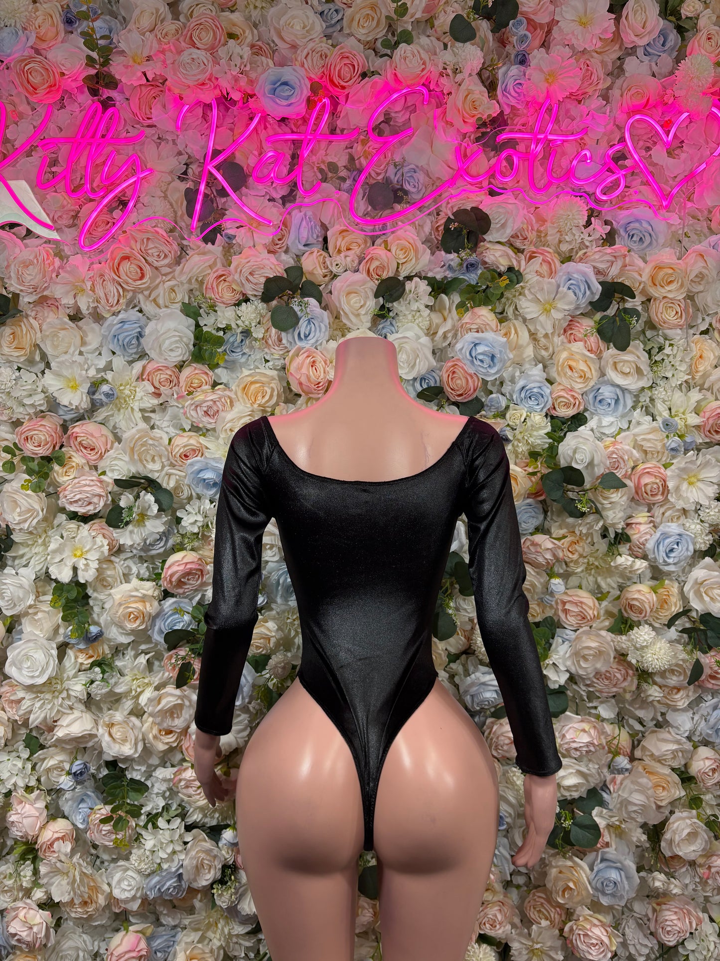 Black long-sleeve bodysuit with scoop back and high-cut legs