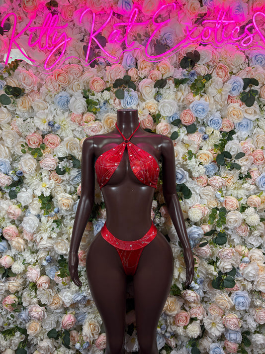 Red sequin bikini set: strappy halter triangle bra and string bottom, front view on mannequin