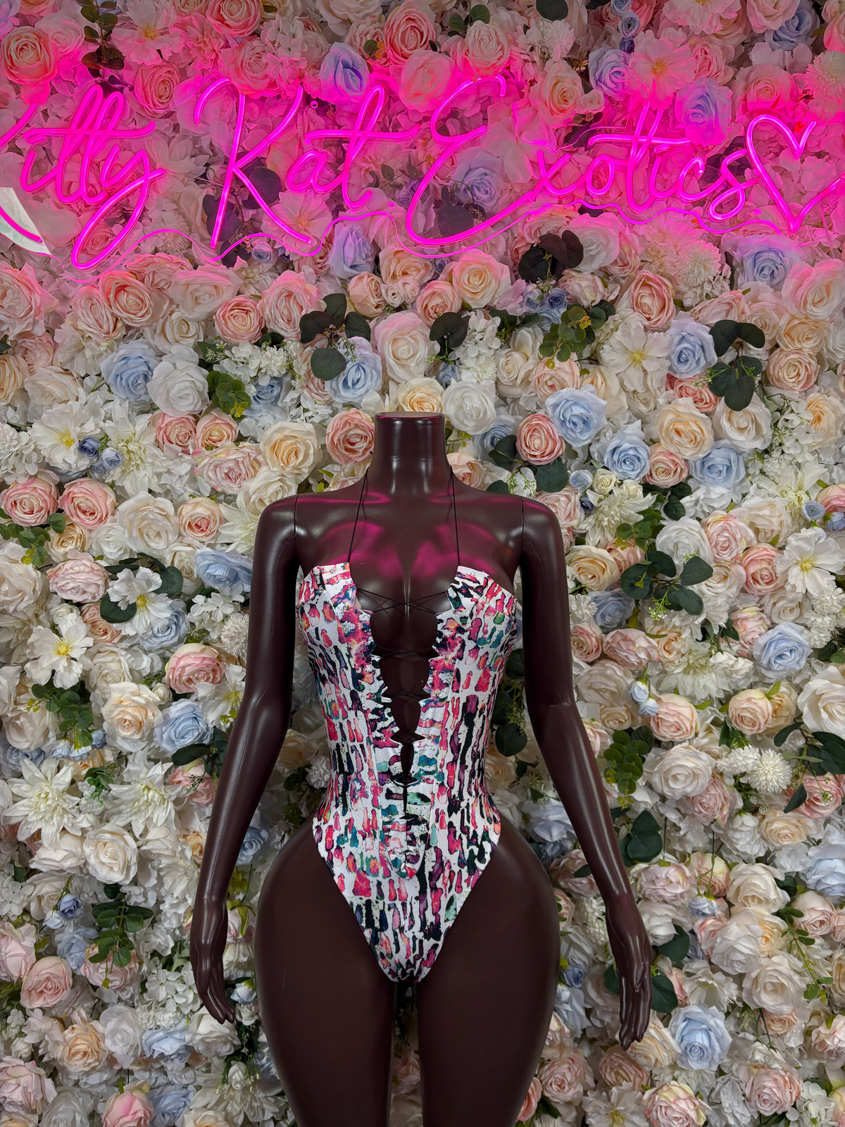 Multicolor patterned bodysuit with deep V front and back, thin straps, high-cut