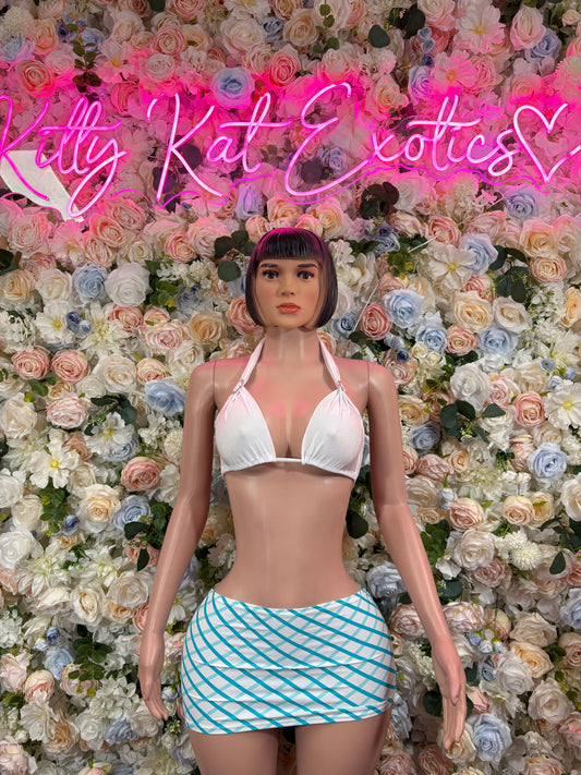 White halter bra top with blue plaid mini skirt and tie-back strings