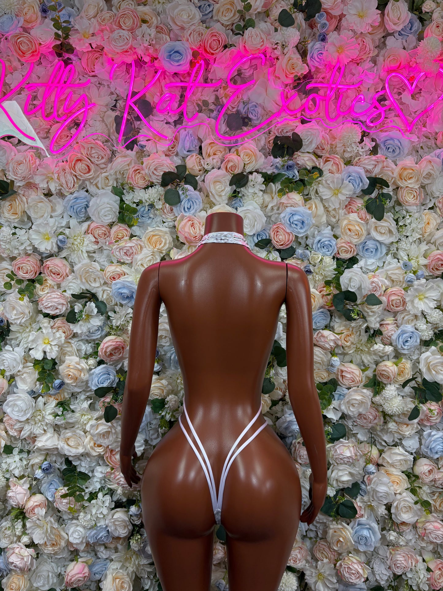 Silver cheetah hologram bodysuit with V-shaped back and high-cut leg