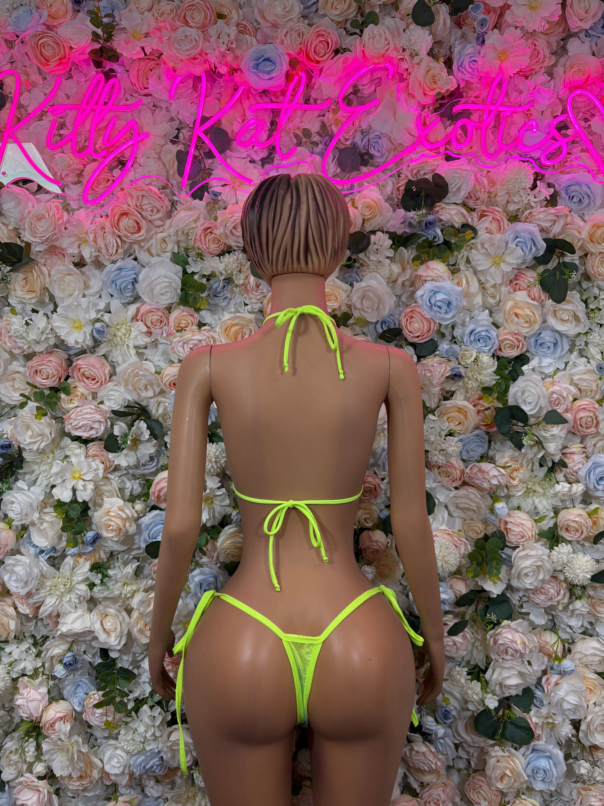 Back view bikini two-piece set with neon green tie strings and pastel cups
