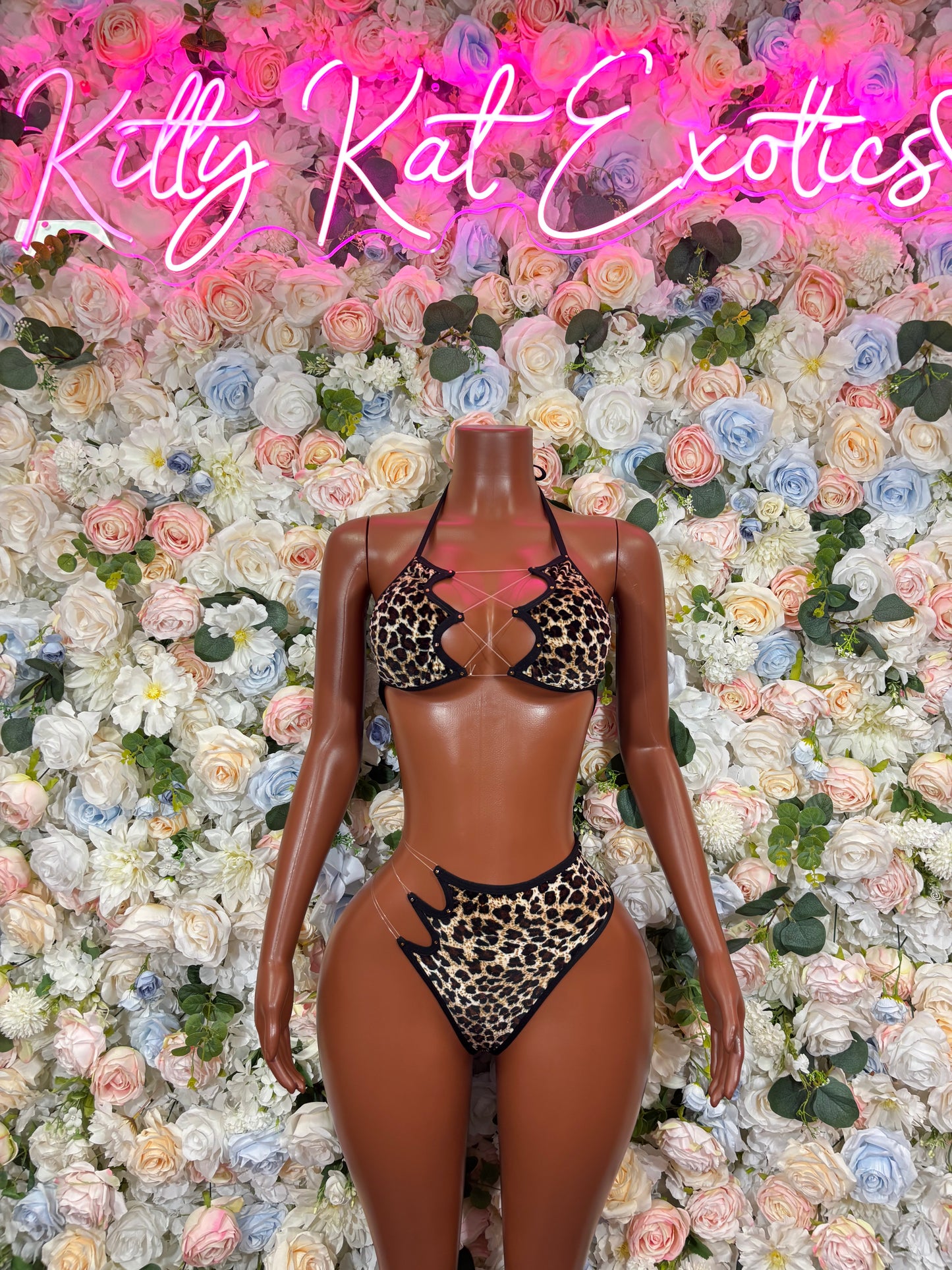 Cheetah-print two-piece rave bikini set, halter bra and thong front view