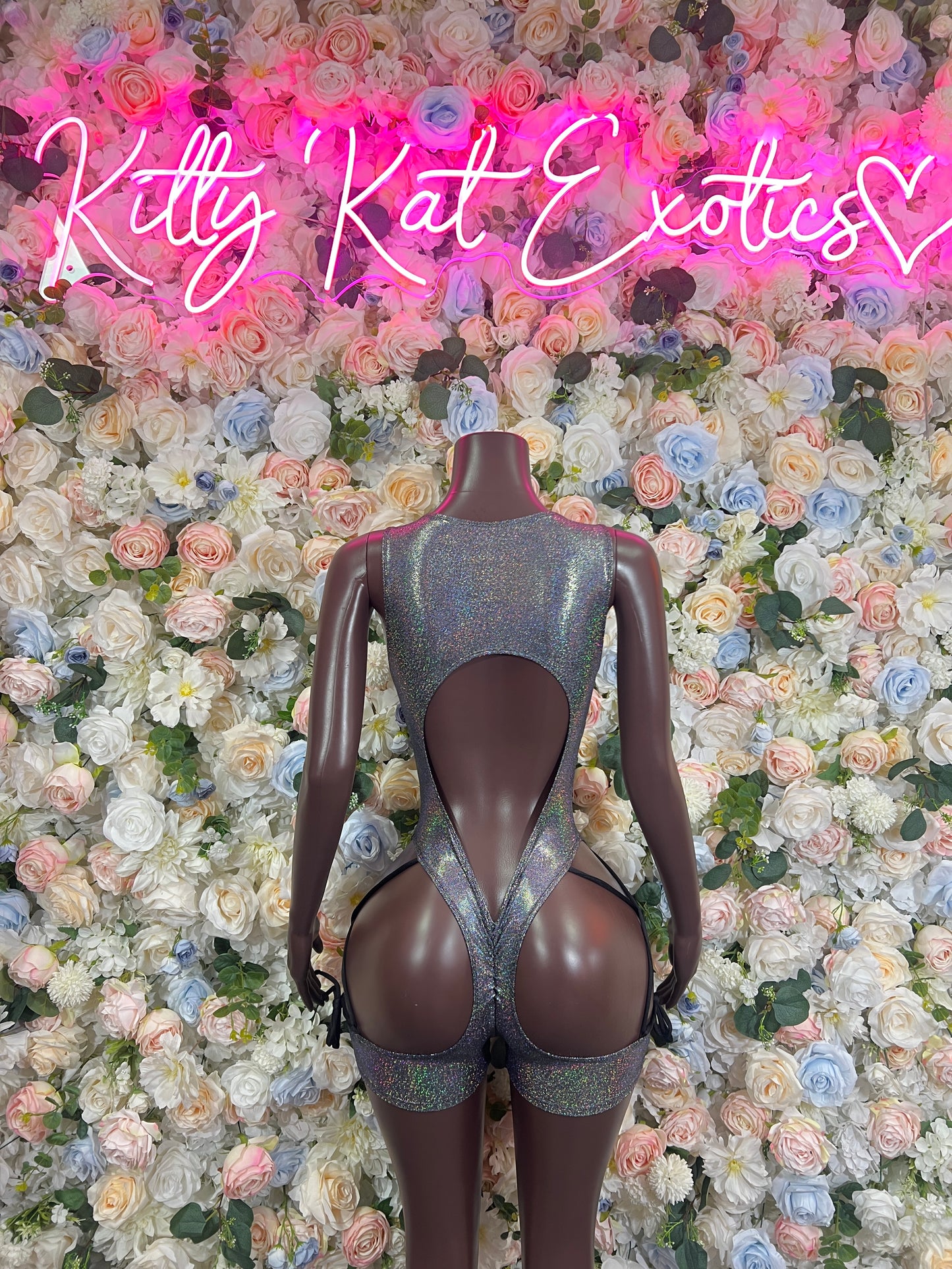 Chrome metallic bodysuit with open back cutout and lace-up details
