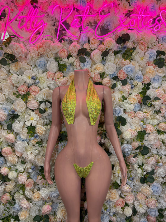 Neon green glitter slingshot bodysuit with triangular front cutout and narrow straps