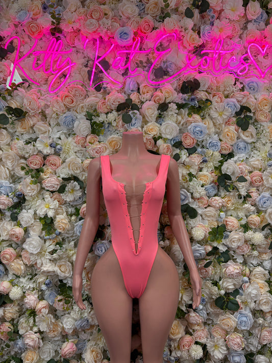 Coral pink high-cut bodysuit with deep V-neck and thin shoulder straps