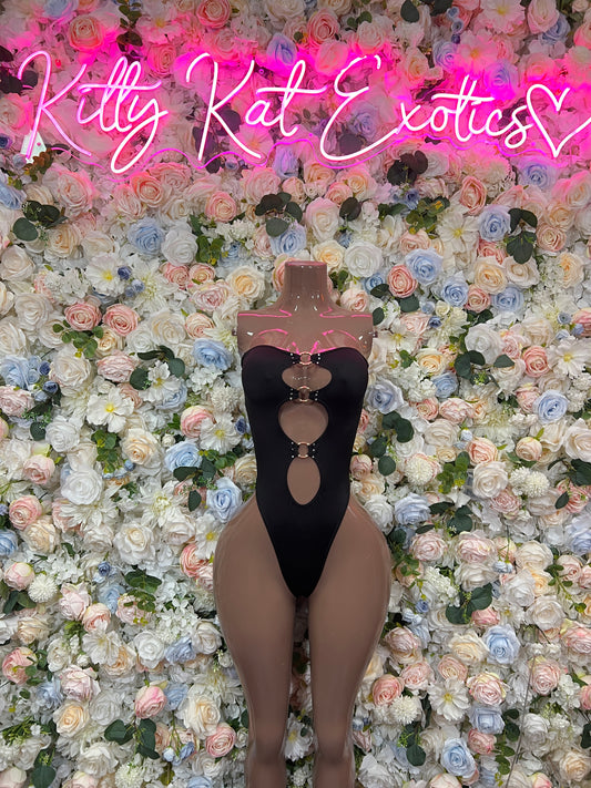 Black halter bodysuit with vertical oval cutout and ring trim front