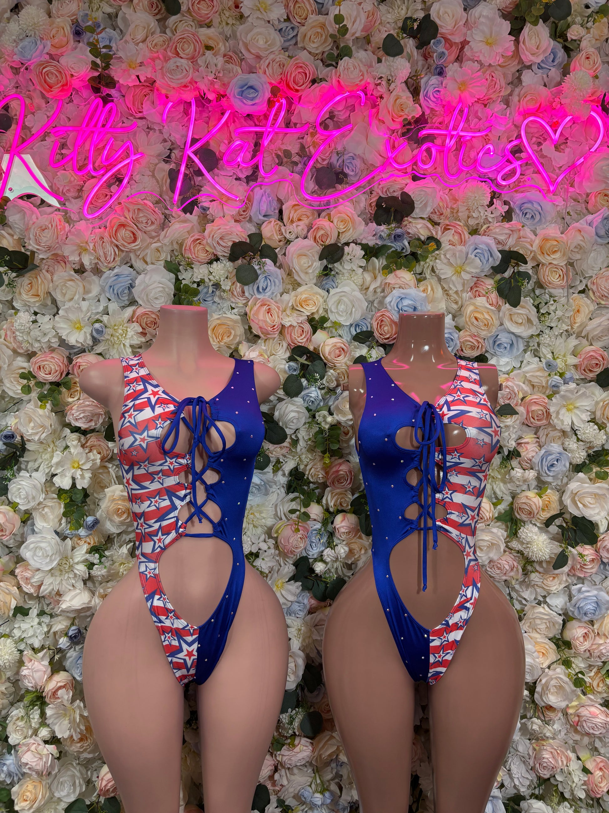 Patriotic flag star bodysuit set on two figures, blue with red-white stars, lace-up