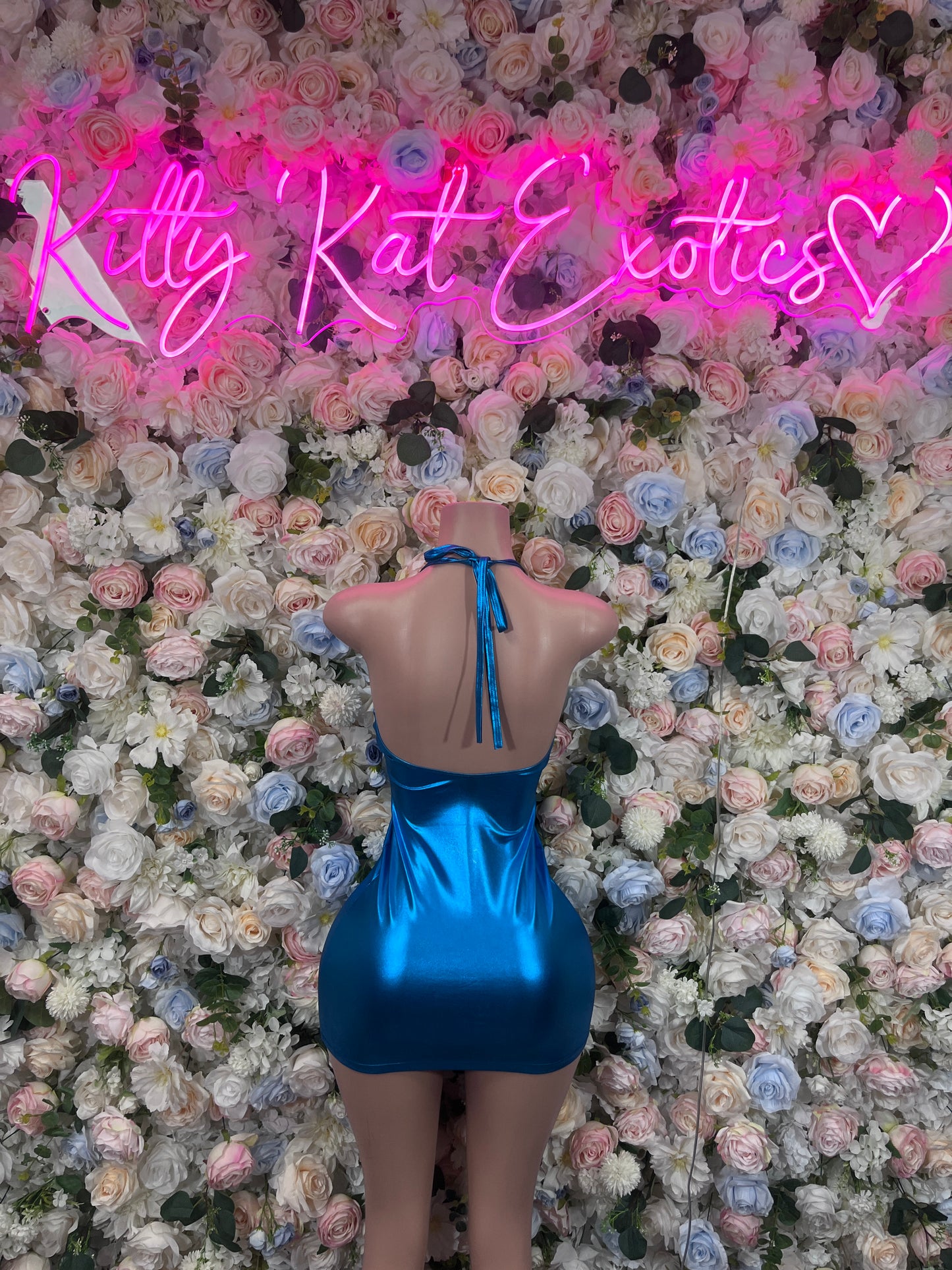 Turquoise metallic mini dress with open back and crisscross tie straps